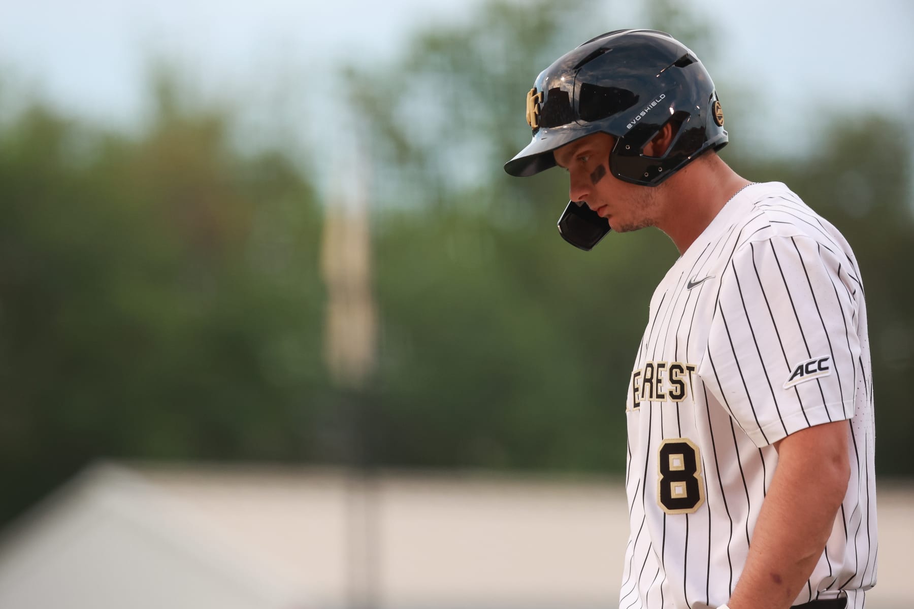 WINSTON SALEM, NORTH CAROLINA - APRIL 19: Nick Kurtz #8 of the Wake Forest Demon Deacons looks on against the Florida State Seminoles at David F. Couch Ballpark on April 19, 2024 in Winston Salem, North Carolina. (Photo by Isaiah Vazquez/Getty Images)