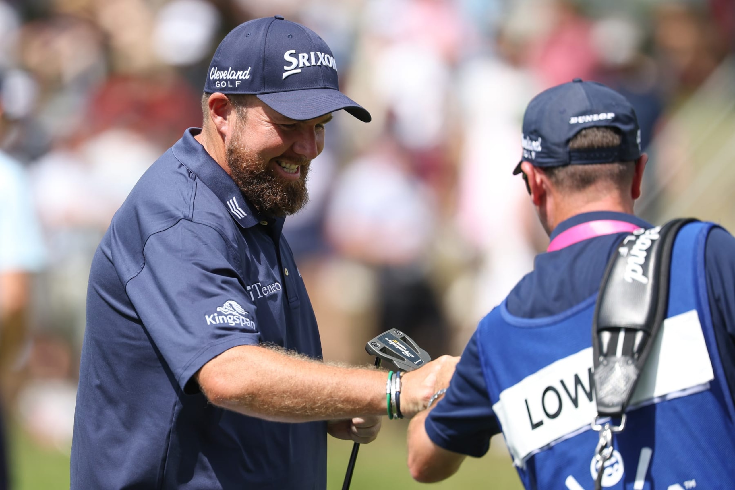 LOUISVILLE, KENTUCKY - MAY 18: Shane Lowry of Ireland reacts to his birdie with his caddie Darren Reynolds on the 14th green during the third round of the 2024 PGA Championship at Valhalla Golf Club on May 18, 2024 in Louisville, Kentucky. (Photo by Patrick Smith/Getty Images)