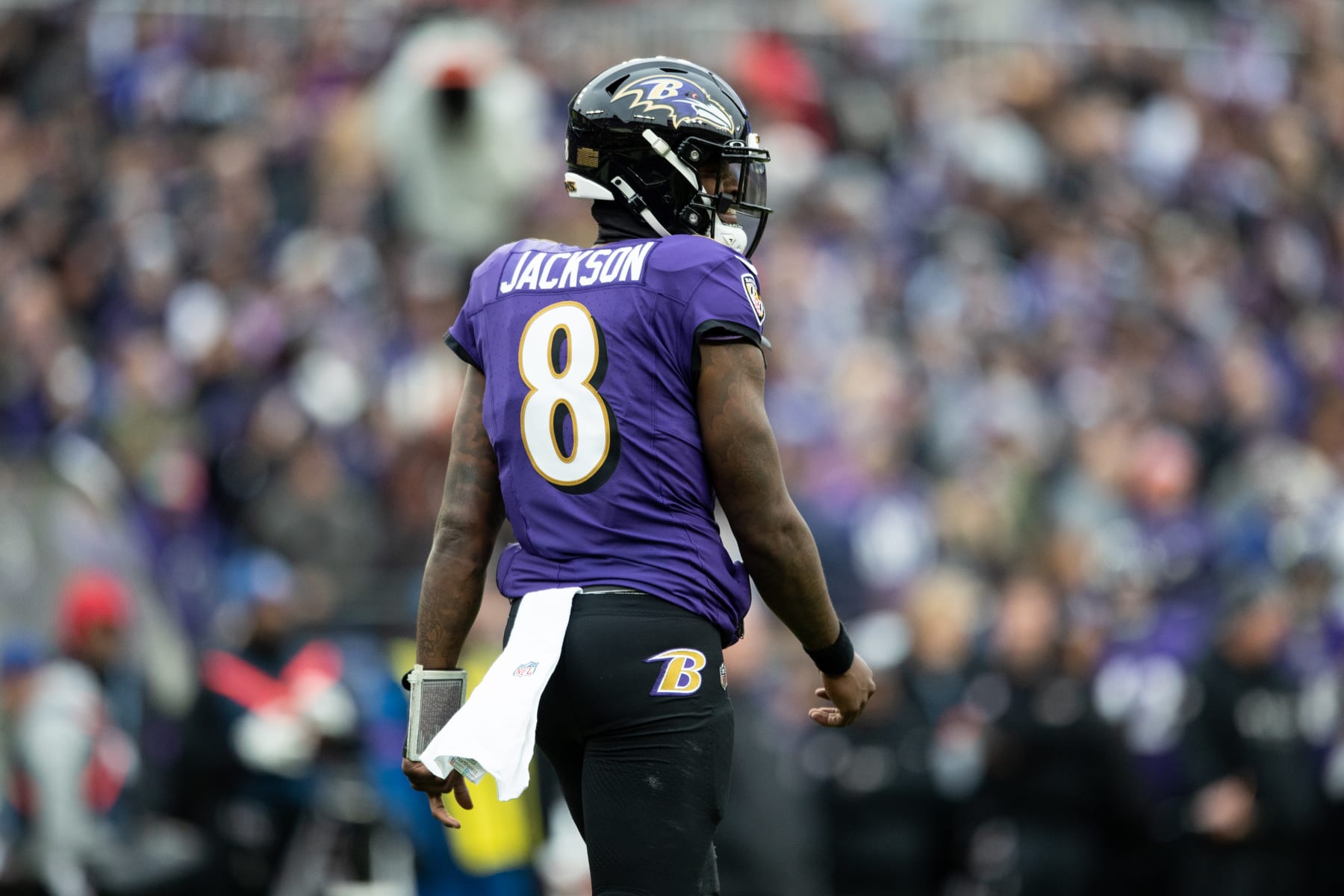 BALTIMORE, MARYLAND - JANUARY 28: Lamar Jackson #8 of the Baltimore Ravens walks between plays during the AFC Championship NFL football game against the Kansas City Chiefs at M&T Bank Stadium on January 28, 2024 in Baltimore, Maryland. (Photo by Kara Durrette/Getty Images)