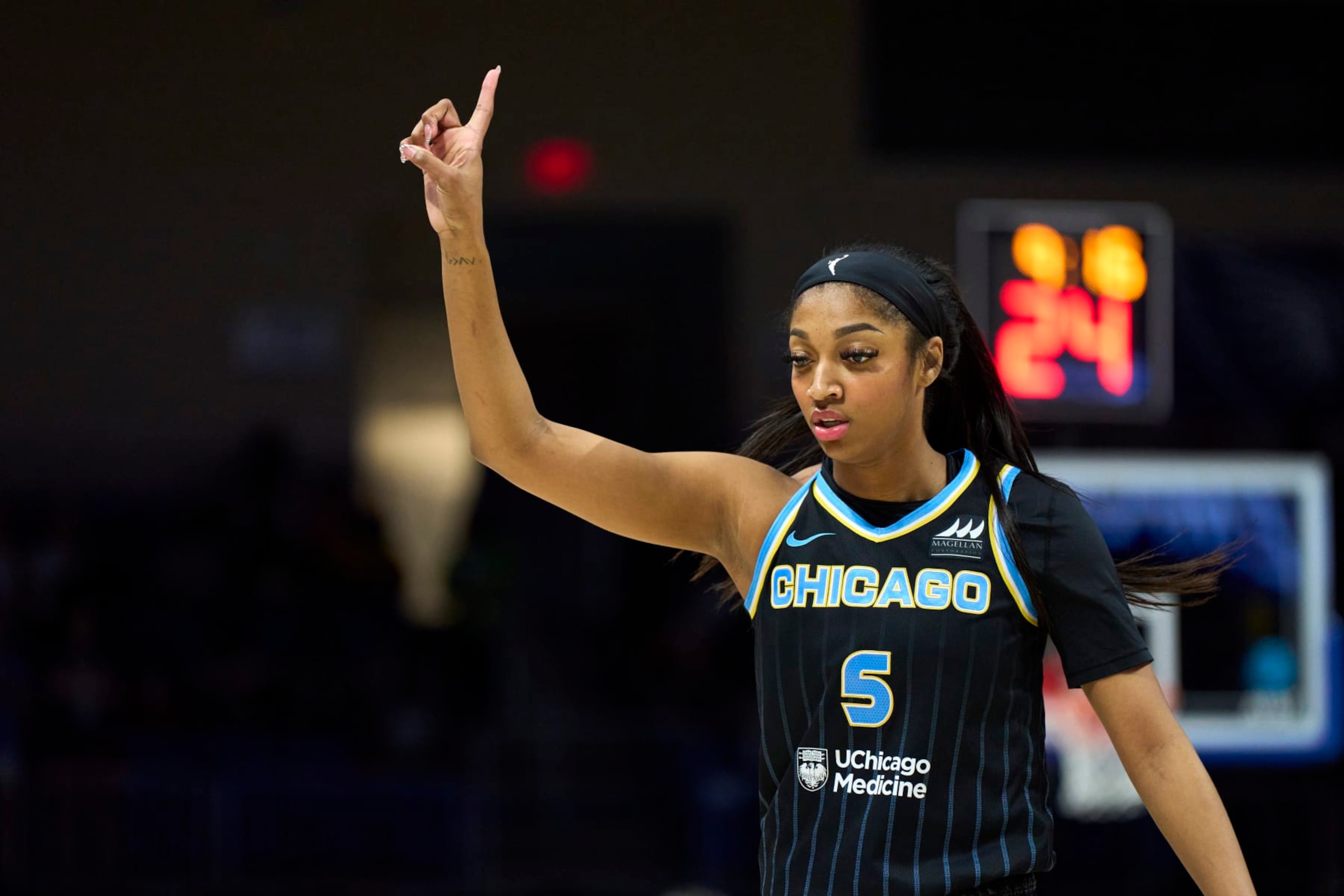 ARLINGTON, TEXAS - MAY 15: Angel Reese #5 of the Chicago Sky reacts after a play against the Dallas Wings at the College Park Center on May 15, 2024 in Arlington, Texas. NOTE TO USER: User expressly acknowledges and agrees that, by downloading and or using this photograph, User is consenting to the terms and conditions of the Getty Images License Agreement.  (Photo by Cooper Neill/Getty Images)
