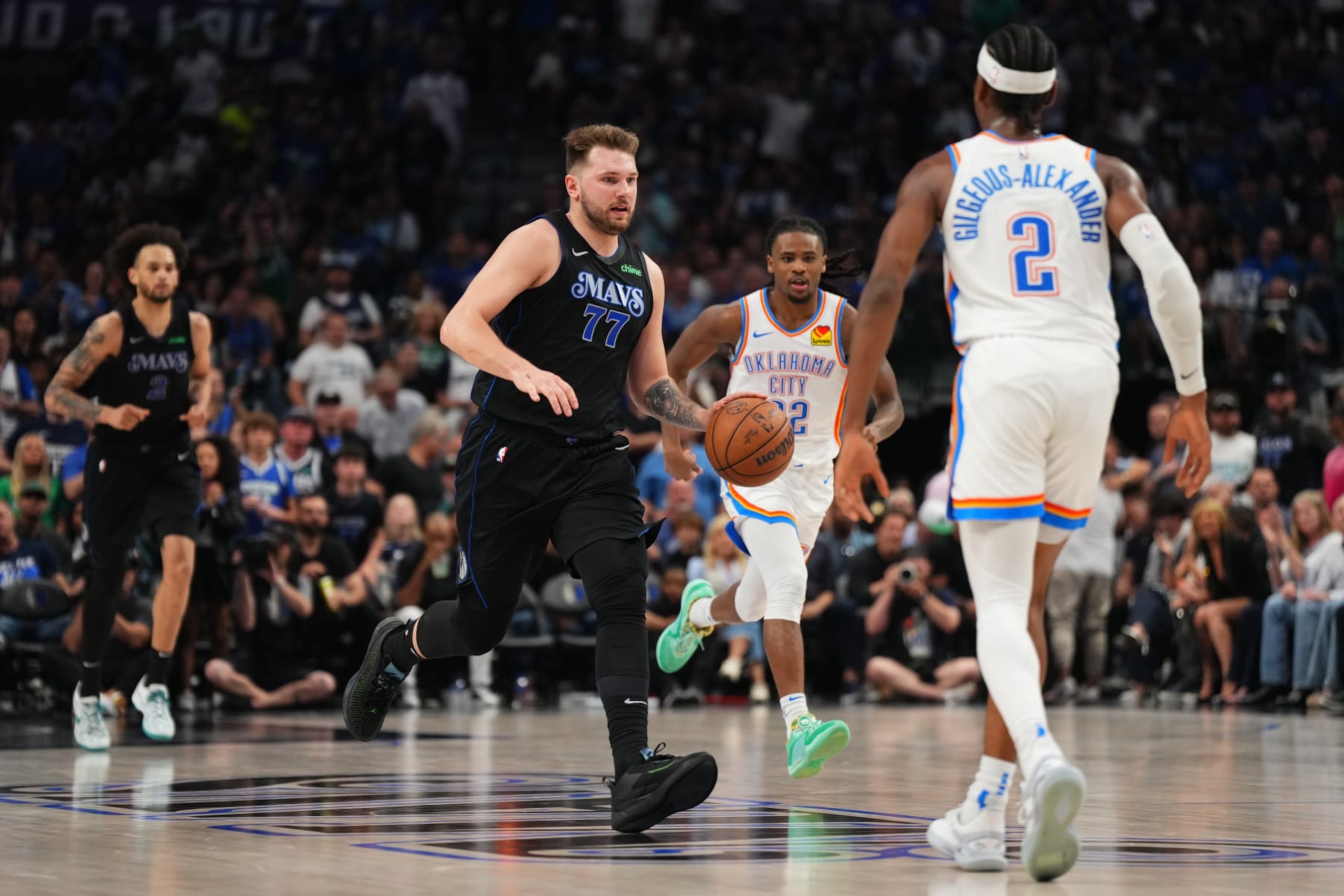 DALLAS, TX - MAY 18: Luka Doncic #77 of the Dallas Mavericks dribbles the ball during the game against the Oklahoma City Thunder during Round 2 Game 6 of the 2024 NBA Playoffs on May 18, 2024 at the American Airlines Center in Dallas, Texas. NOTE TO USER: User expressly acknowledges and agrees that, by downloading and or using this photograph, User is consenting to the terms and conditions of the Getty Images License Agreement. Mandatory Copyright Notice: Copyright 2024 NBAE (Photo by Cooper Neill/NBAE via Getty Images)