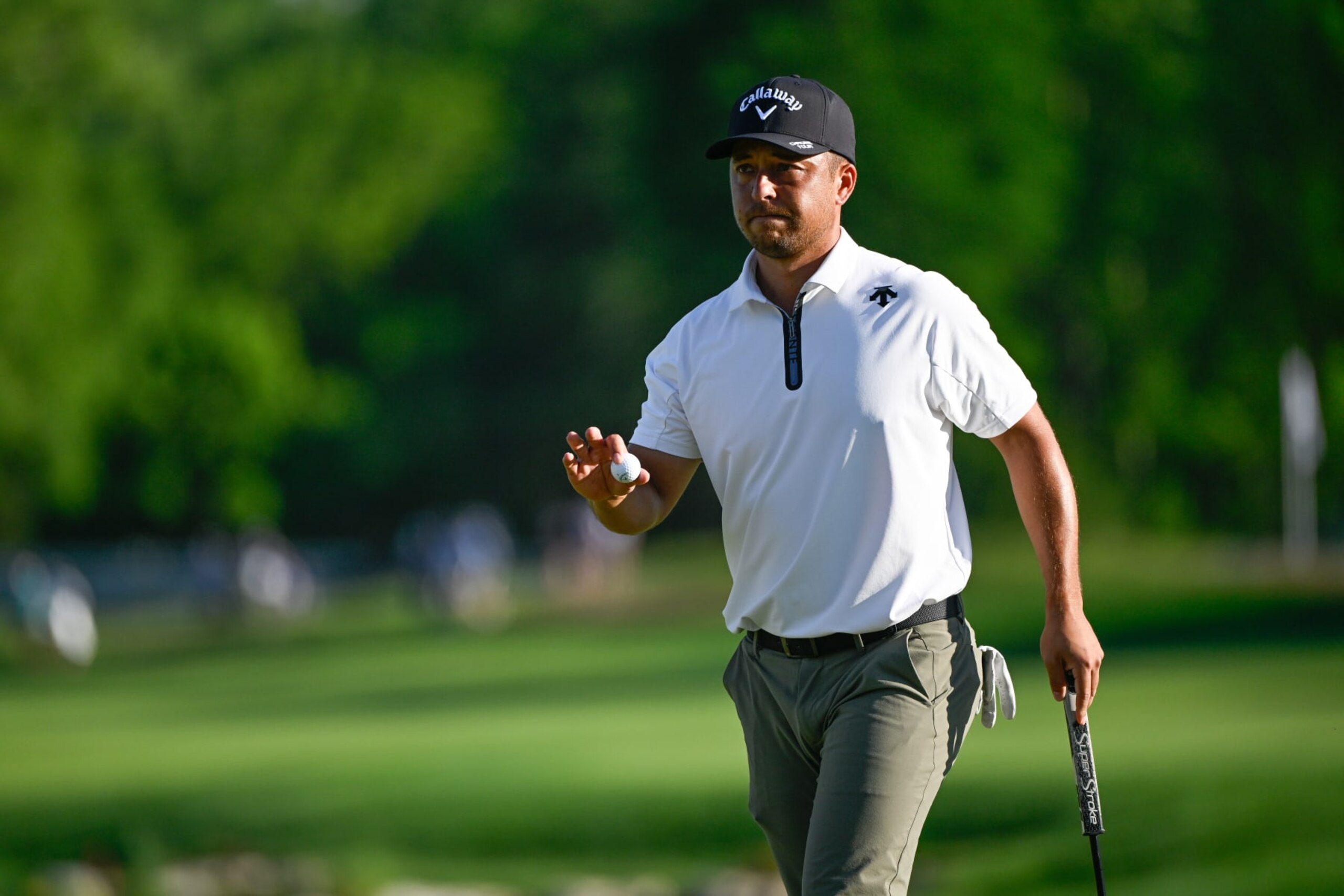 LOUISVILLE, KENTUCKY - MAY 18: Xander Schauffele waves his ball on the 18th green during the third round of  PGA Championship at Valhalla Golf Club on May 18, 2024 in Louisville, Kentucky. (Photo by Ben Jared/PGA TOUR via Getty Images)