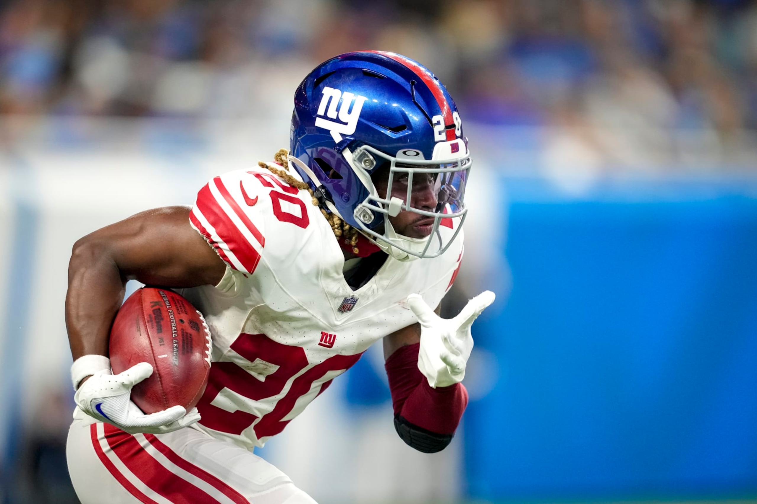 DETROIT, MICHIGAN - AUGUST 11: Eric Gray #20 of the New York Giants runs the ball against the Detroit Lions during the third quarter of the preseason game at Ford Field on August 11, 2023 in Detroit, Michigan. (Photo by Nic Antaya/Getty Images)
