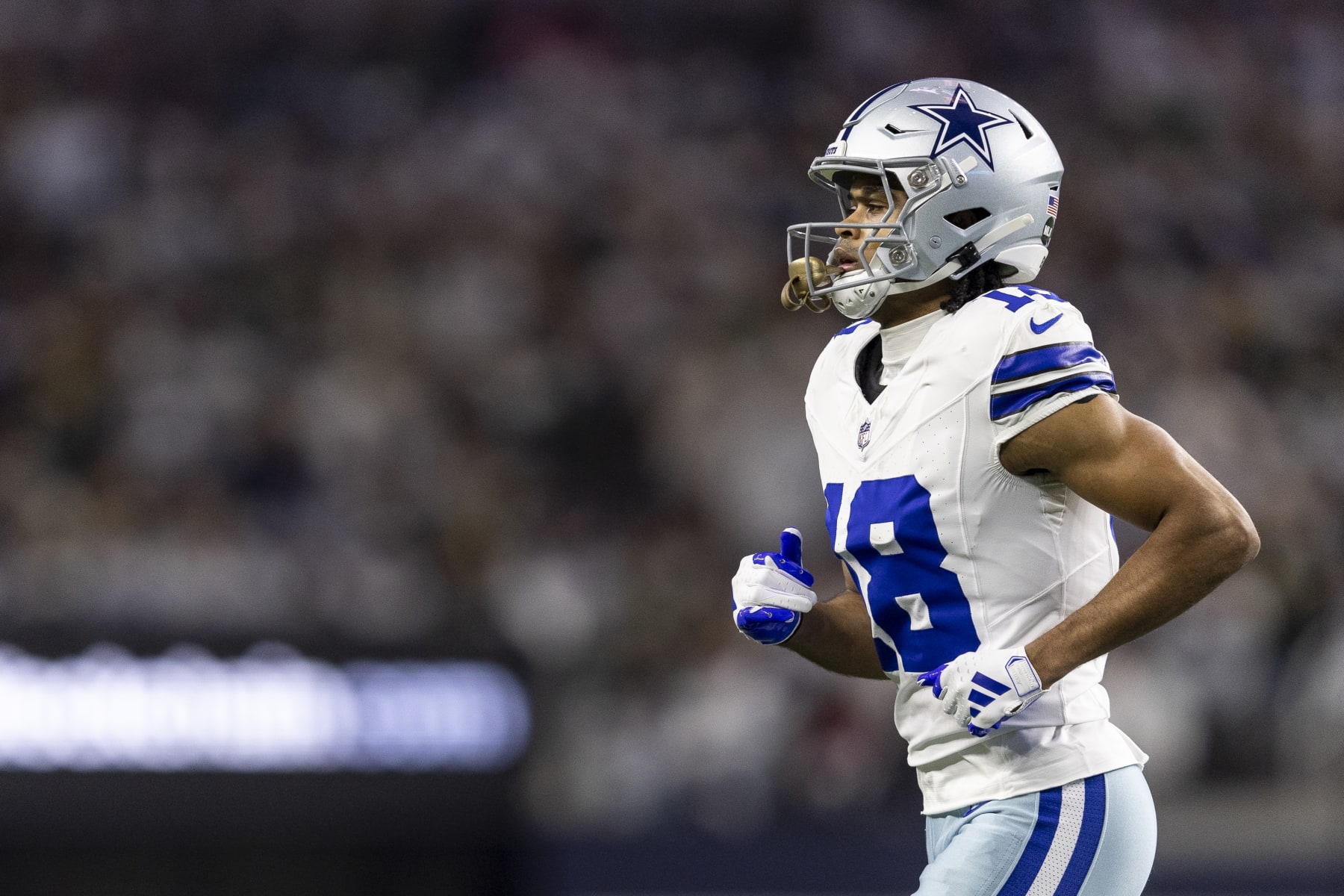 ARLINGTON, TEXAS - JANUARY 14: Jalen Tolbert #18 of the Dallas Cowboys runs during an NFL wild-card playoff football game between the Dallas Cowboys and the Green Bay Packers at AT&T Stadium on January 14, 2024 in Arlington, Texas. (Photo by Michael Owens/Getty Images)