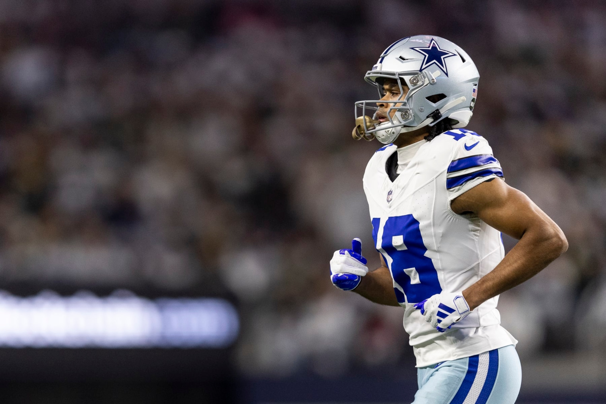 ARLINGTON, TEXAS - JANUARY 14: Jalen Tolbert #18 of the Dallas Cowboys runs during an NFL wild-card playoff football game between the Dallas Cowboys and the Green Bay Packers at AT&T Stadium on January 14, 2024 in Arlington, Texas. (Photo by Michael Owens/Getty Images) ARLINGTON, TEXAS - JANUARY 14: Jalen Tolbert #18 of the Dallas Cowboys runs during an NFL wild-card playoff football game between the Dallas Cowboys and the Green Bay Packers at AT&T Stadium on January 14, 2024 in Arlington, Texas. (Photo by Michael Owens/Getty Images)