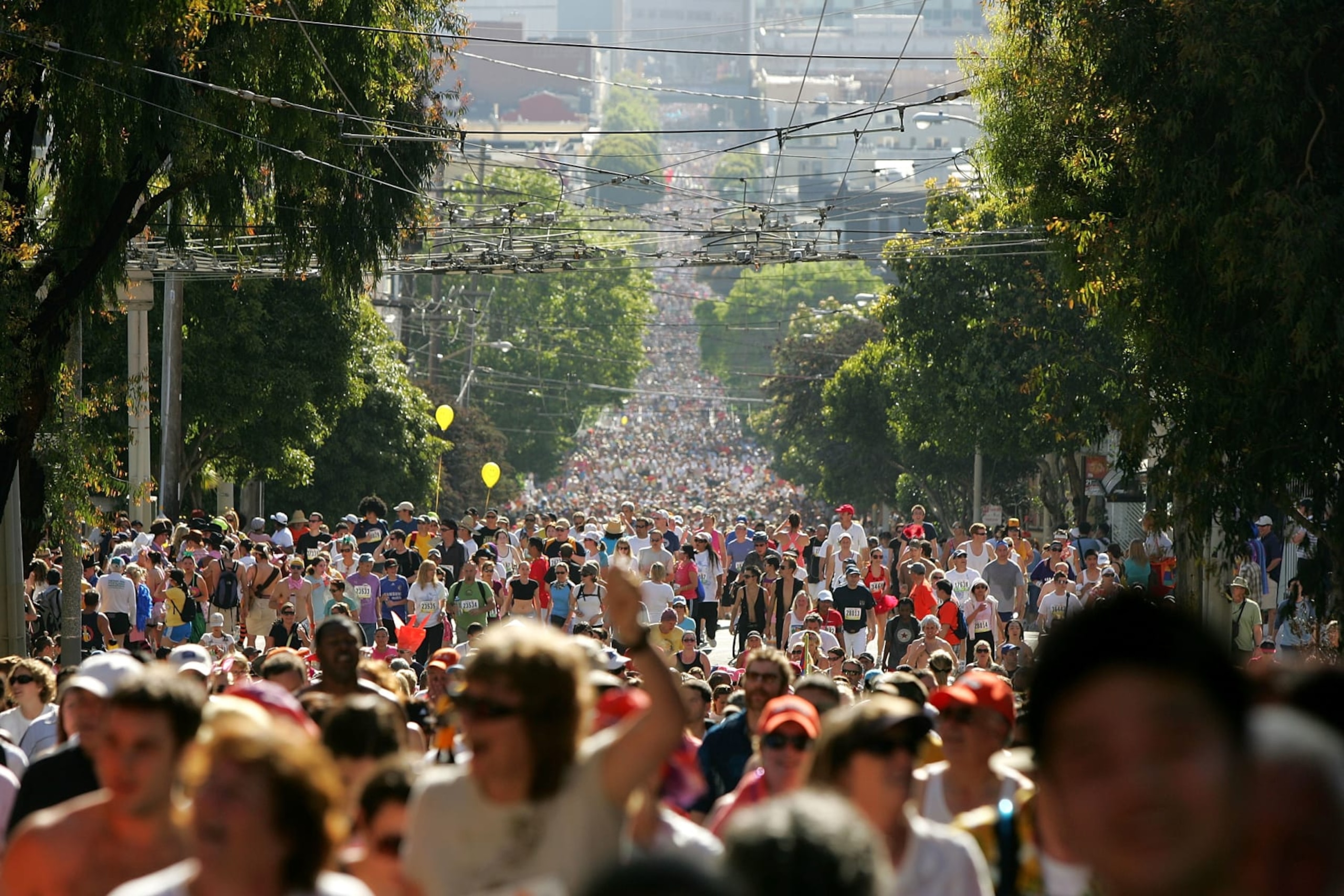SAN FRANCISCO - MAY 17:  Participants run up Hayes Street Hill during the ING Bay to Breakers race May 17, 2009 in San Francisco, California.  Now in its 98th year, the ING Bay to Breakers 12K is one of the world's largest and oldest footraces, featuring world-class athletes in addition to costumed runners.  (Photo by Ezra Shaw/Getty Images)