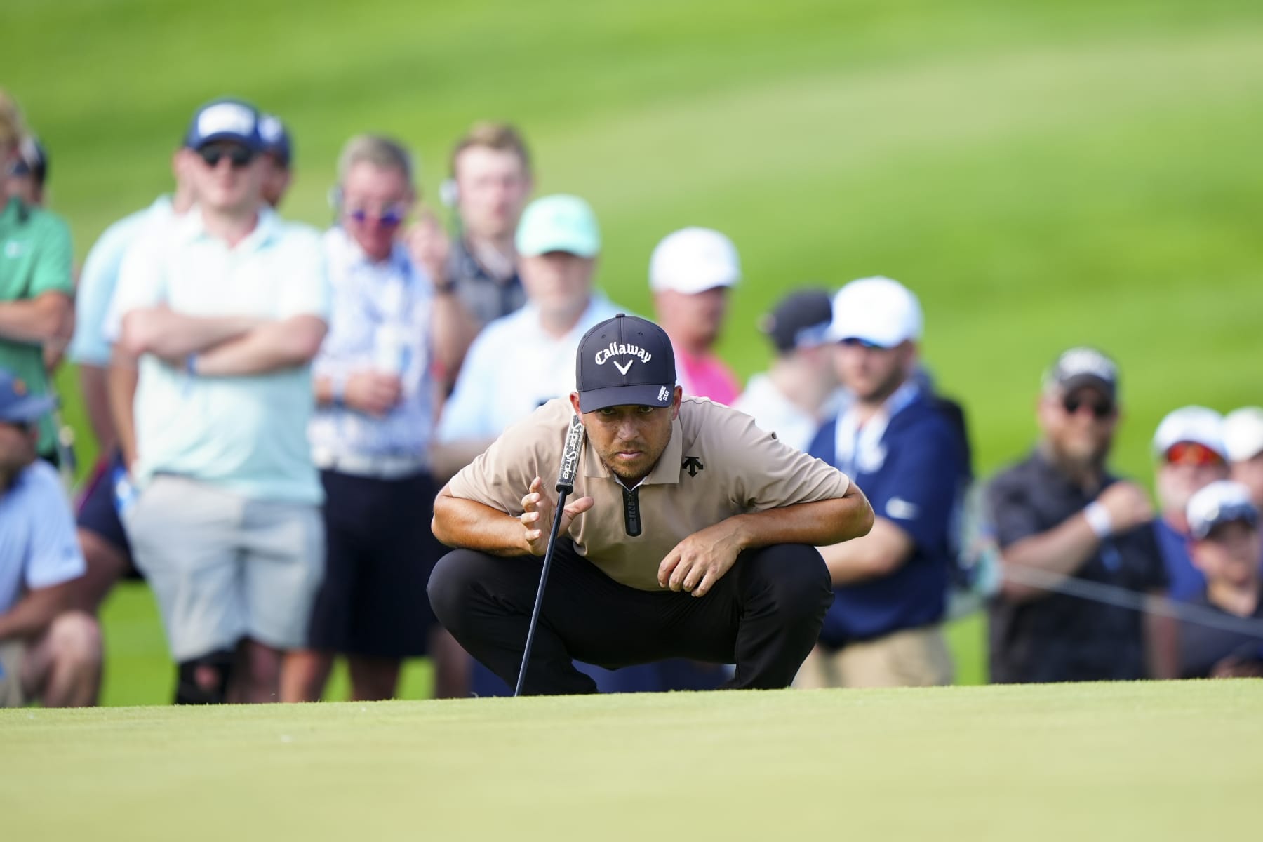LOUISVILLE, KY - MAY 19: Xander Schauffele reads his putt on the 12th hole during the final round of the PGA Championship at Valhalla Golf Club on Sunday, May 19, 2024 in Louisville, Kentucky. (Photo by Darren Carroll/PGA of America via Getty Images)
