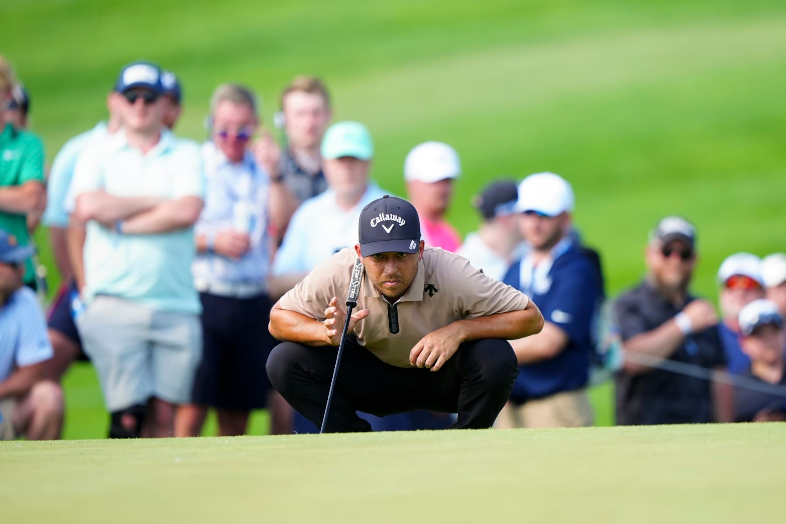 LOUISVILLE, KY - MAY 19: Xander Schauffele reads his putt on the 12th hole during the final round of the PGA Championship at Valhalla Golf Club on Sunday, May 19, 2024 in Louisville, Kentucky. (Photo by Darren Carroll/PGA of America via Getty Images)