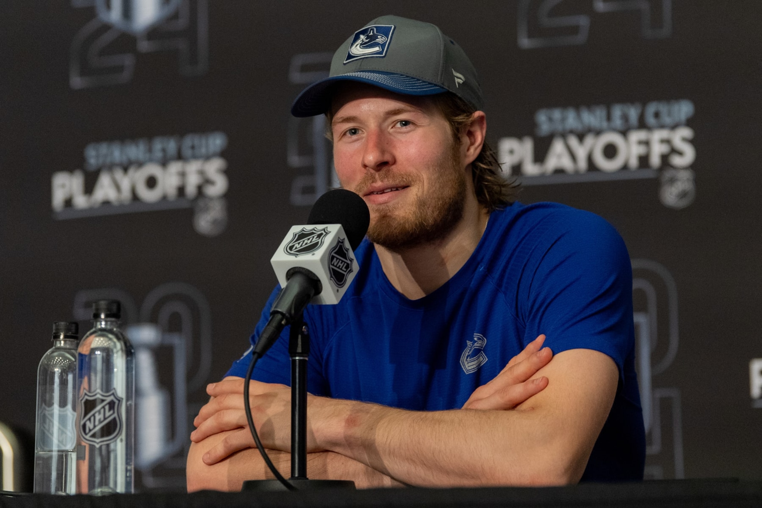 EDMONTON, CANADA - MAY 12: Brock Boeser of the Vancouver Canucks addresses the media after his team's victory over the Edmonton Oilers in Game Three of the Second Round of the 2024 Stanley Cup Playoffs at Rogers Place on May 12, 2024, in Edmonton, Alberta, Canada. (Photo by Andy Devlin/NHLI via Getty Images) EDMONTON, CANADA - MAY 12: Brock Boeser of the Vancouver Canucks addresses the media after his team's victory over the Edmonton Oilers in Game Three of the Second Round of the 2024 Stanley Cup Playoffs at Rogers Place on May 12, 2024, in Edmonton, Alberta, Canada. (Photo by Andy Devlin/NHLI via Getty Images)