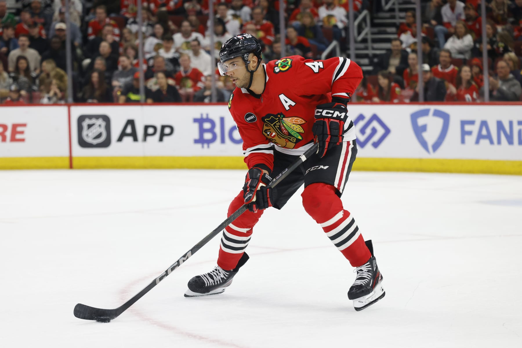 CHICAGO, IL - APRIL 12: Chicago Blackhawks defenseman Seth Jones (4) skates with the puck against the Nashville Predators during an NHL game on April 12, 2024 at United Center in Chicago, Illinois. (Photo by Joe Robbins/Icon Sportswire via Getty Images)