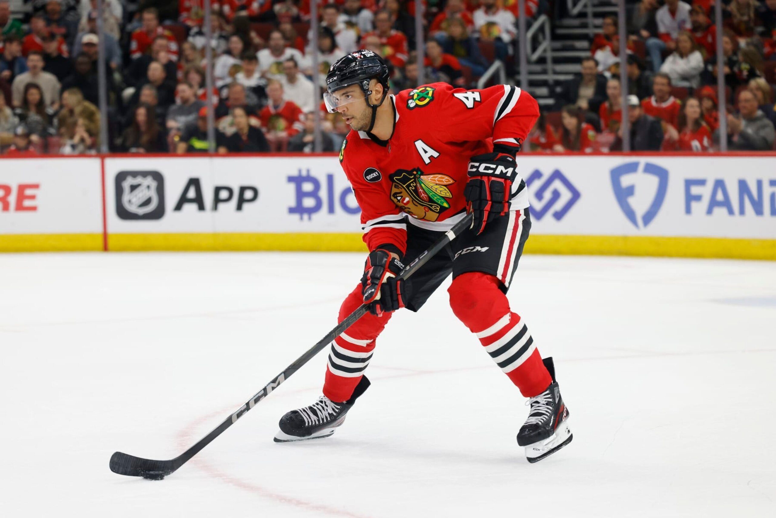 CHICAGO, IL - APRIL 12: Chicago Blackhawks defenseman Seth Jones (4) skates with the puck against the Nashville Predators during an NHL game on April 12, 2024 at United Center in Chicago, Illinois. (Photo by Joe Robbins/Icon Sportswire via Getty Images)