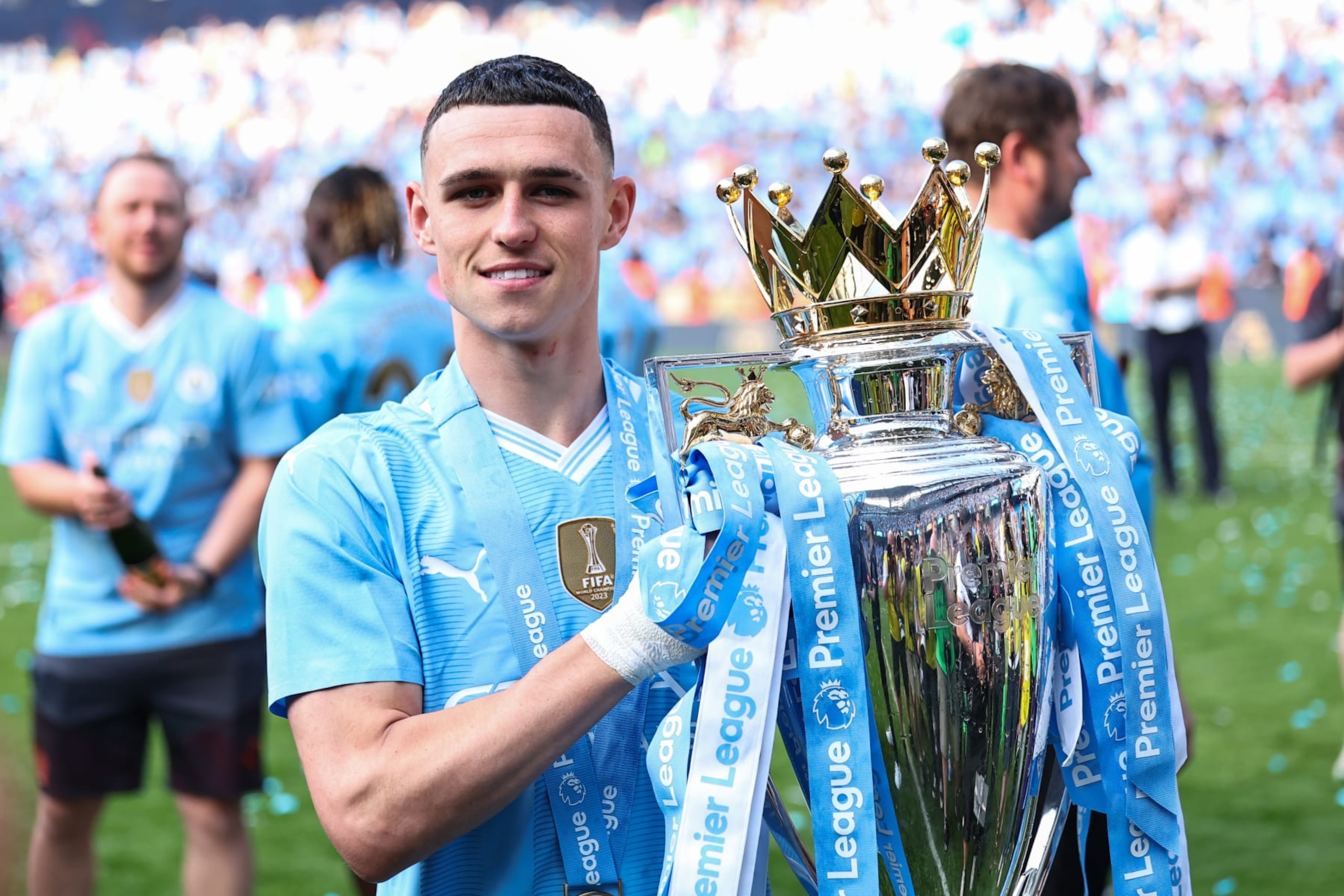 MANCHESTER, ENGLAND - MAY 19:  Phil Foden of Manchester City with the Premier League trophy during the Premier League match between Manchester City and West Ham United at Etihad Stadium on May 19, 2024 in Manchester, England.(Photo by Robbie Jay Barratt - AMA/Getty Images)