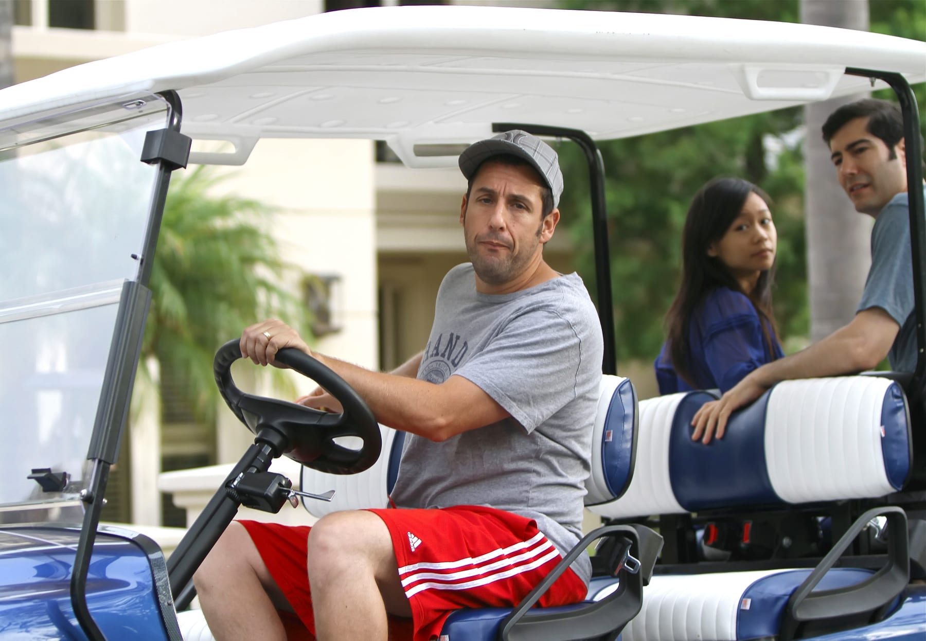 LOS ANGELES, CA - SEPTEMBER 22: Adam Sandler is seen riding on his golf cart on September 22, 2012 in Los Angeles, California.  (Photo by Bauer-Griffin/GC Images)