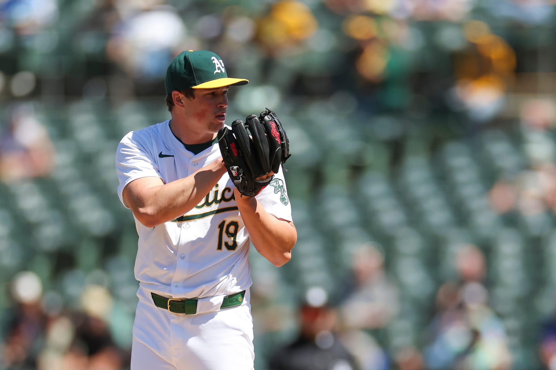 OAKLAND, CALIFORNIA - MAY 8: Mason Miller #19 of the Oakland Athletics gets set to throw a pitch in the eighth inning during game one of a double-header against the Texas Rangers at the Oakland Coliseum on May 8, 2024 in Oakland, California. (Photo by Brandon Sloter/Image Of Sport/Getty Images)