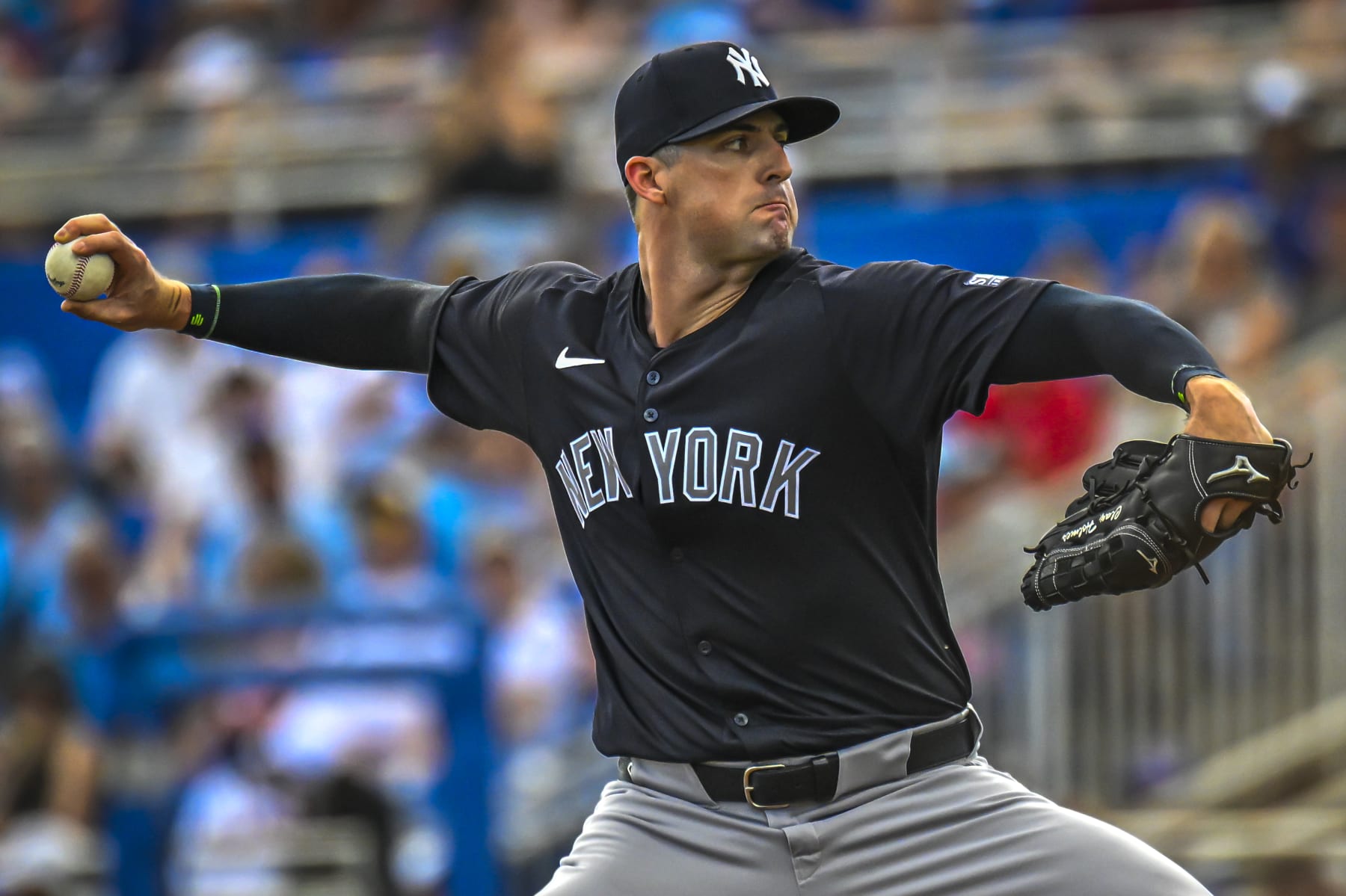 DUNEDIN, FLORIDA - MARCH 8: New York Yankees pitcher Clay Holmes throws against the Toronto Blue Jays during a MLB spring training game at TD Ballpark, on March 8, 2024. In Dunedin, Florida (Miguel J. Rodriguez Carrillo/VIEWpress)