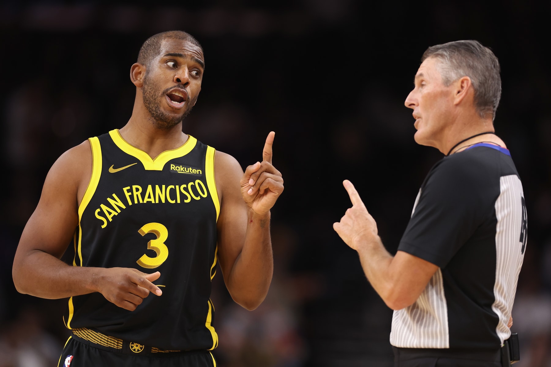 PHOENIX, ARIZONA - NOVEMBER 22: Chris Paul #3 of the Golden State Warriors reacts to referee Scott Foster #48 during the first half of the NBA game against the Phoenix Suns at Footprint Center on November 22, 2023 in Phoenix, Arizona. NOTE TO USER: User expressly acknowledges and agrees that, by downloading and or using this photograph, User is consenting to the terms and conditions of the Getty Images License Agreement.  (Photo by Christian Petersen/Getty Images)