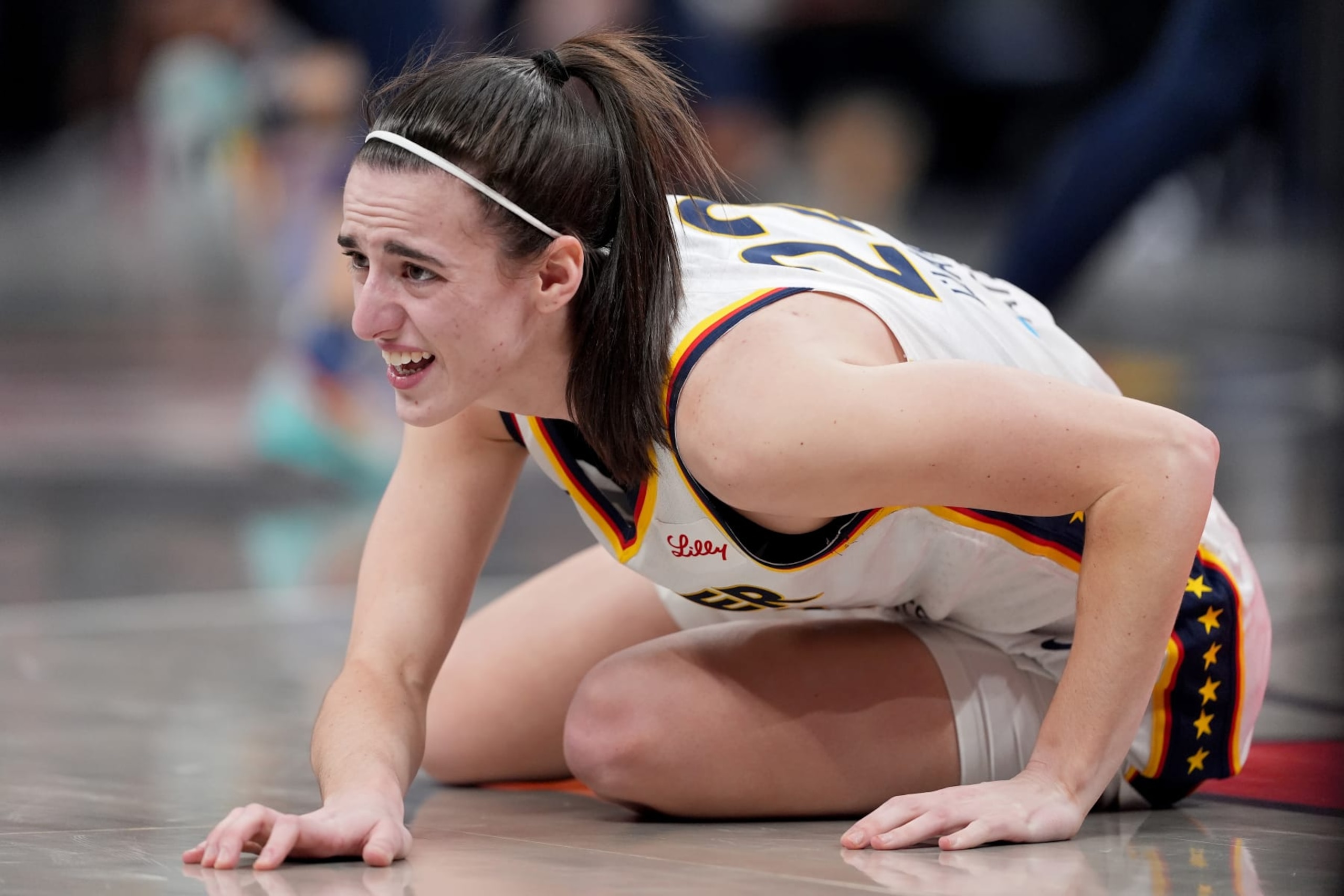 INDIANAPOLIS, INDIANA - MAY 20: Caitlin Clark #22 of the Indiana Fever reacts to an injury during the second quarter in the game at Gainbridge Fieldhouse on May 20, 2024 in Indianapolis, Indiana. NOTE TO USER: User expressly acknowledges and agrees that, by downloading and or using this photograph, User is consenting to the terms and conditions of the Getty Images License Agreement. (Photo by Emilee Chinn/Getty Images)