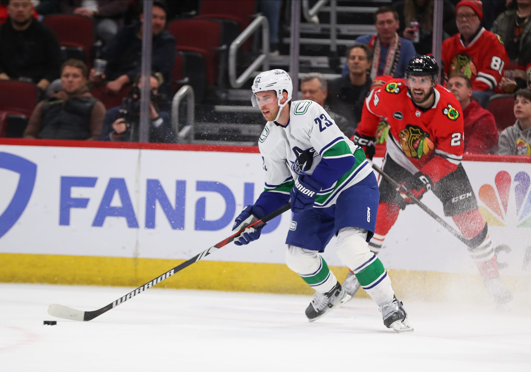 CHICAGO, IL - FEBRUARY 13: Elias Lindholm #23 of the Vancouver Canucks controls the puck during the second period against the Chicago Blackhawks at the United Center on February 13, 2024 in Chicago, Illinois. (Photo by Melissa Tamez/Icon Sportswire via Getty Images)