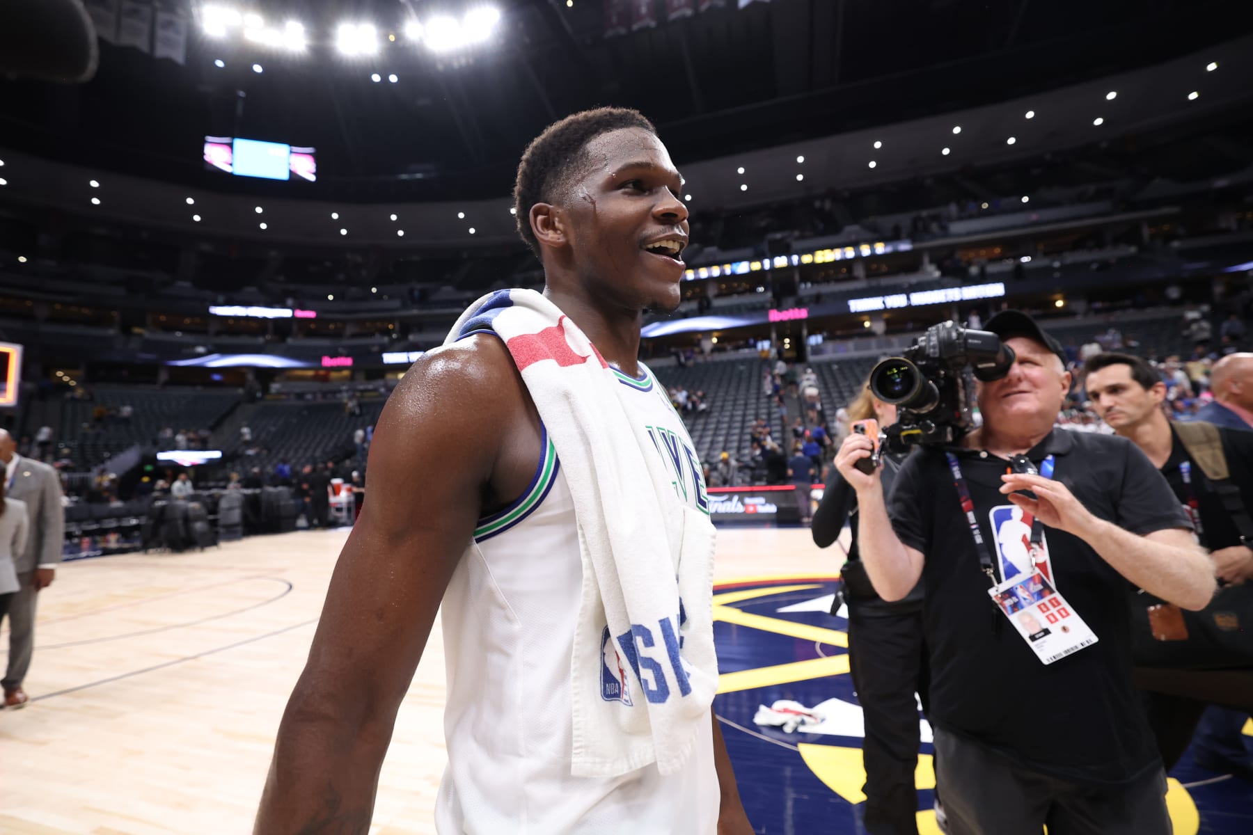 DENVER, CO - MAY 19: Anthony Edwards #5 of the Minnesota Timberwolves  smiles after the game  against the Denver Nuggets during Round 2 Game 7 of the 2024 NBA Playoffs on May 19, 2024 at the Ball Arena in Denver, Colorado. NOTE TO USER: User expressly acknowledges and agrees that, by downloading and/or using this Photograph, user is consenting to the terms and conditions of the Getty Images License Agreement. Mandatory Copyright Notice: Copyright 2023 NBAE (Photo by David Sherman/NBAE via Getty Images)