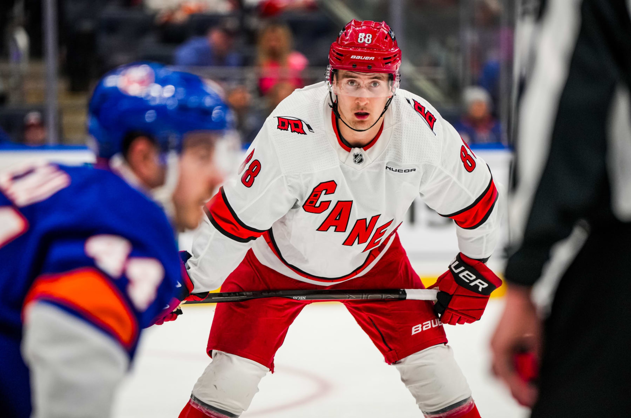 ELMONT, NEW YORK - APRIL 27: Martin Necas #88 of the Carolina Hurricanes looks on during the first period against the New York Islanders in Game Four of the First Round of the 2024 Stanley Cup Playoffs at UBS Arena on April 27, 2024 in Elmont, New York. (Photo by Josh Lavallee/NHLI via Getty Images) ELMONT, NEW YORK - APRIL 27: Martin Necas #88 of the Carolina Hurricanes looks on during the first period against the New York Islanders in Game Four of the First Round of the 2024 Stanley Cup Playoffs at UBS Arena on April 27, 2024 in Elmont, New York. (Photo by Josh Lavallee/NHLI via Getty Images)