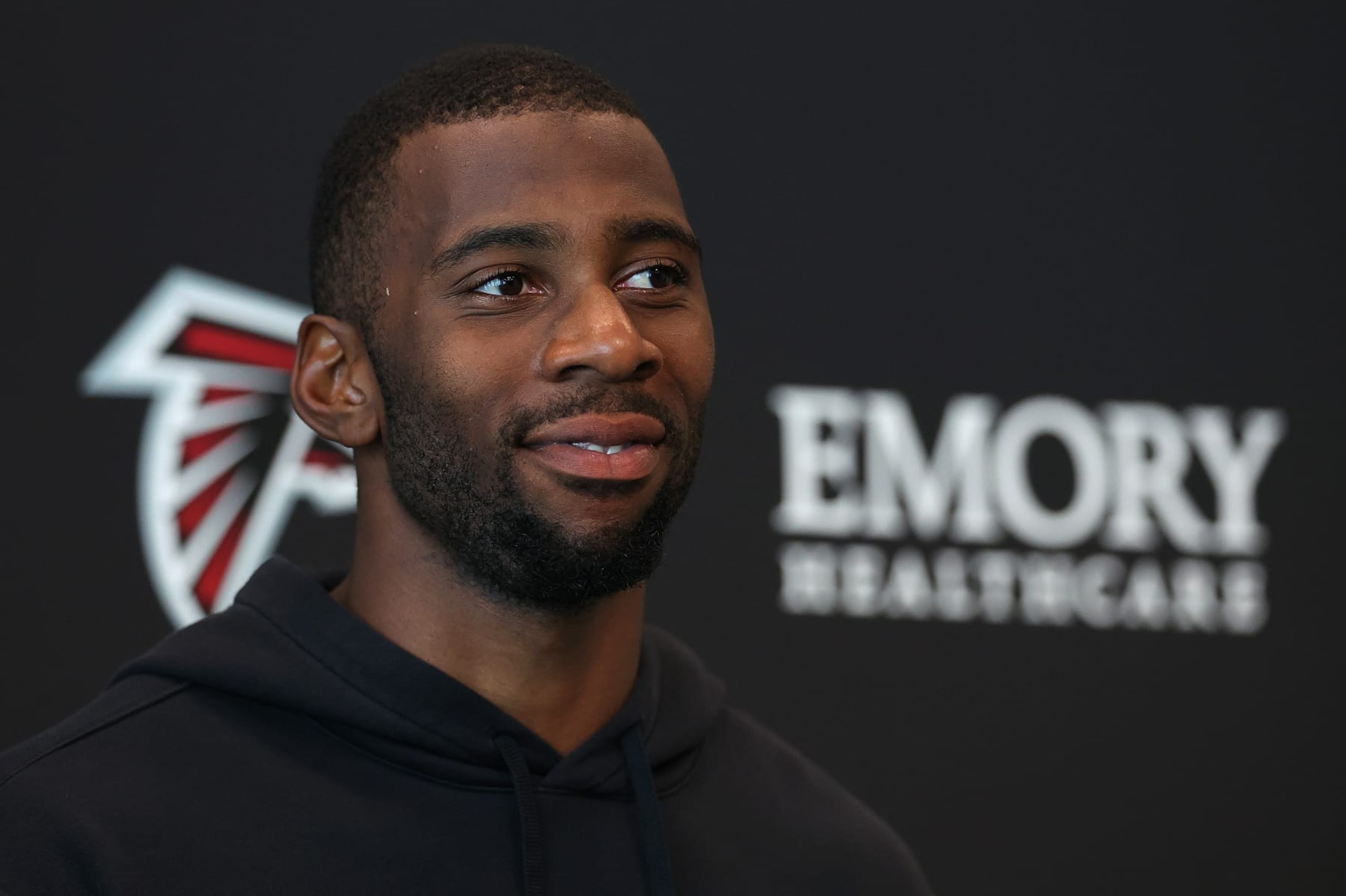 FLOWERY BRANCH, GEORGIA - MAY 14:  Quarterback Kyle Pitts #8 of the Atlanta Falcons speaks to the media during OTA offseason workouts at the Atlanta Falcons training facility on May 14, 2024 in Flowery Branch, Georgia. (Photo by Kevin C. Cox/Getty Images)