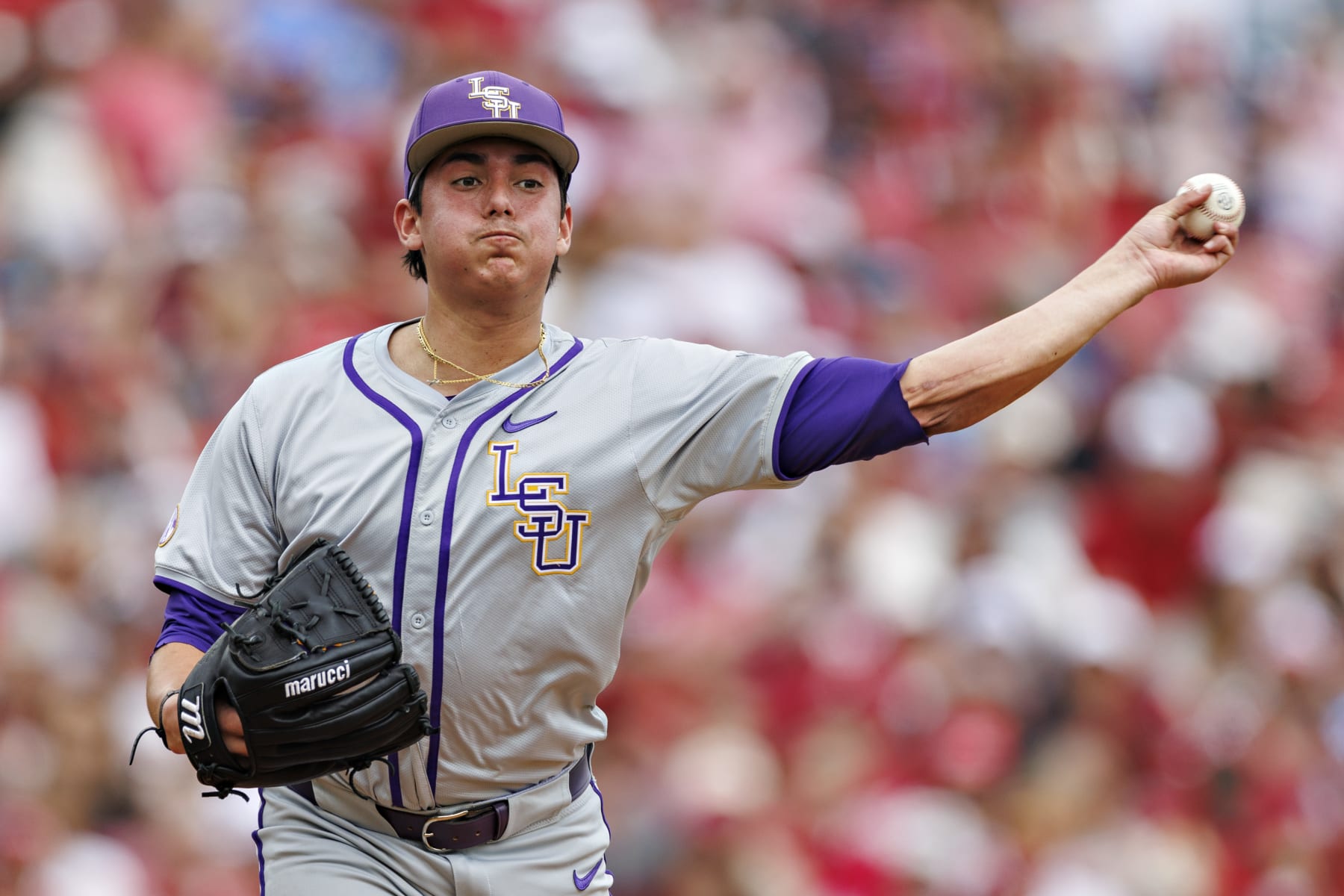 FAYETTEVILLE, ARKANSAS - MARCH 30: Gage Jump #23 of the LSU Tigers throws to first base during the game against the Arkansas Razorbacks at Baum-Walker Stadium at George Cole Field on March 30, 2024 in Fayetteville, Arkansas.  The Razorbacks defeated the Tigers 7-5.  (Photo by Wesley Hitt/Getty Images)
