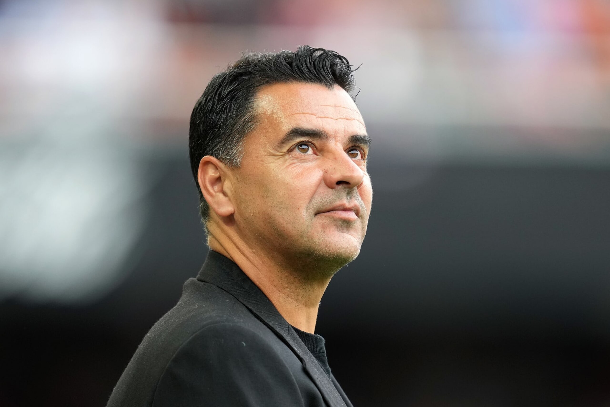 VALENCIA, SPAIN - MAY 19: Michel, Head Coach of Girona FC, looks on prior to the LaLiga EA Sports match between Valencia CF and Girona FC at Estadio Mestalla on May 19, 2024 in Valencia, Spain. (Photo by Aitor Alcalde/Getty Images)
