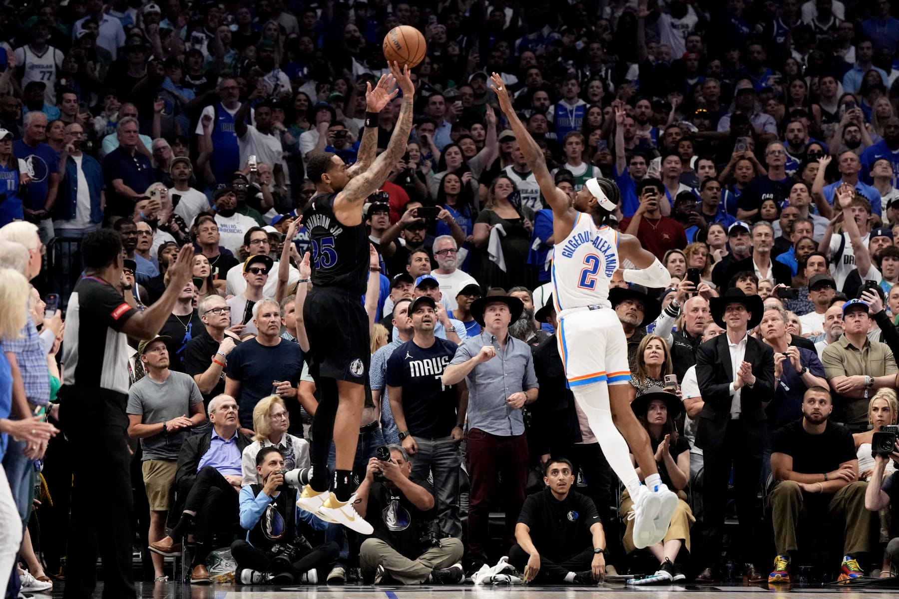DALLAS, TEXAS - MAY 18: P.J. Washington #25 of the Dallas Mavericks shoots as Shai Gilgeous-Alexander #2 of the Oklahoma City Thunder \defends during the second half of Game Six of the Western Conference Second Round Playoffs at American Airlines Center on May 18, 2024 in Dallas, Texas. NOTE TO USER: User expressly acknowledges and agrees that, by downloading and or using this photograph, User is consenting to the terms and conditions of the Getty Images License Agreement. (Photo by Sam Hodde/Getty Images)