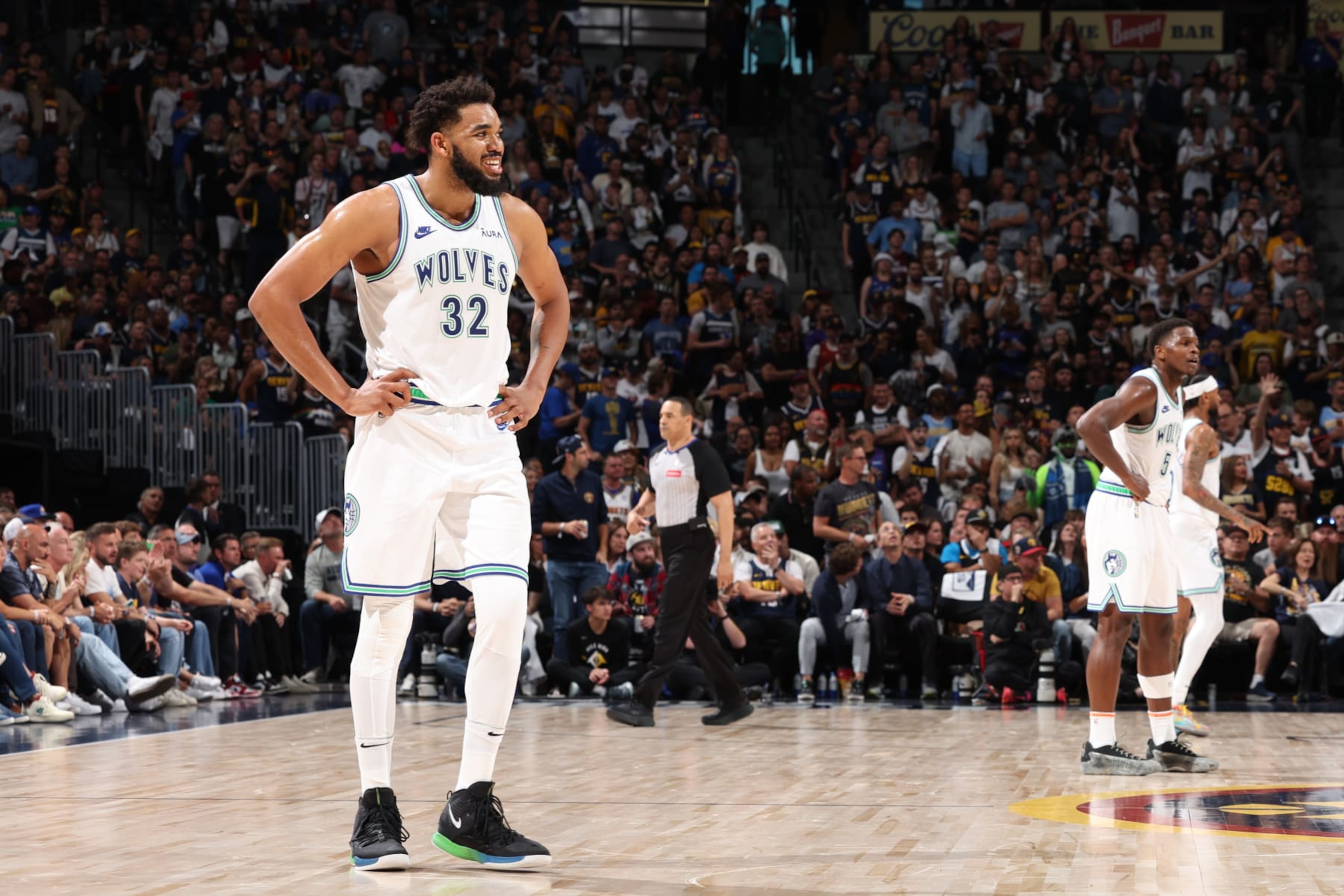 DENVER, CO - MAY 19: Karl-Anthony Towns #32 of the Minnesota Timberwolves looks on during the game against the Denver Nuggets during Round 2 Game 7 of the 2024 NBA Playoffs on May 19, 2024 at the Ball Arena in Denver, Colorado. NOTE TO USER: User expressly acknowledges and agrees that, by downloading and/or using this Photograph, user is consenting to the terms and conditions of the Getty Images License Agreement. Mandatory Copyright Notice: Copyright 2023 NBAE (Photo by David Sherman/NBAE via Getty Images)