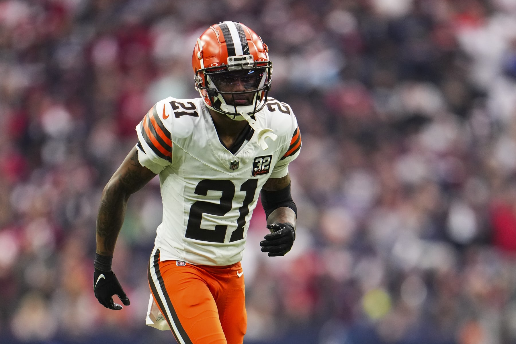 HOUSTON, TX - JANUARY 13: Denzel Ward #21 of the Cleveland Browns defends in coverage during an NFL wild-card playoff football game against the Houston Texans at NRG Stadium on January 13, 2024 in Houston, Texas. (Photo by Cooper Neill/Getty Images)