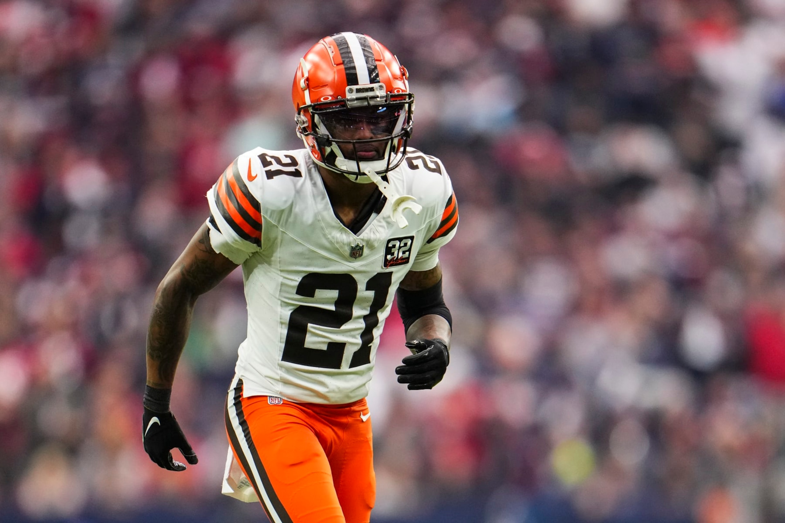 HOUSTON, TX - JANUARY 13: Denzel Ward #21 of the Cleveland Browns defends in coverage during an NFL wild-card playoff football game against the Houston Texans at NRG Stadium on January 13, 2024 in Houston, Texas. (Photo by Cooper Neill/Getty Images)
