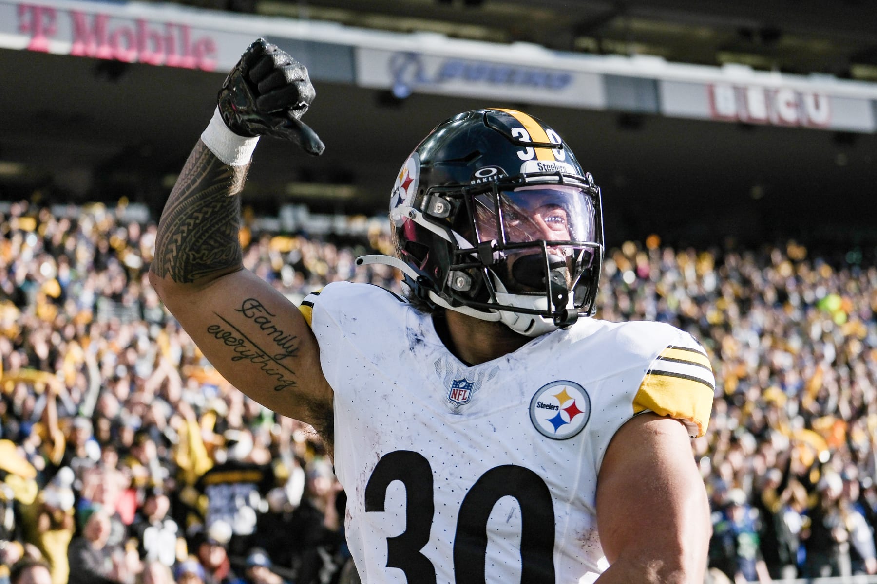 SEATTLE, WASHINGTON - DECEMBER 31: Jaylen Warren #30 of the Pittsburgh Steelers reacts after a first quarter touchdown against the Seattle Seahawks at Lumen Field on December 31, 2023 in Seattle, Washington. (Photo by Conor Courtney/Getty Images)