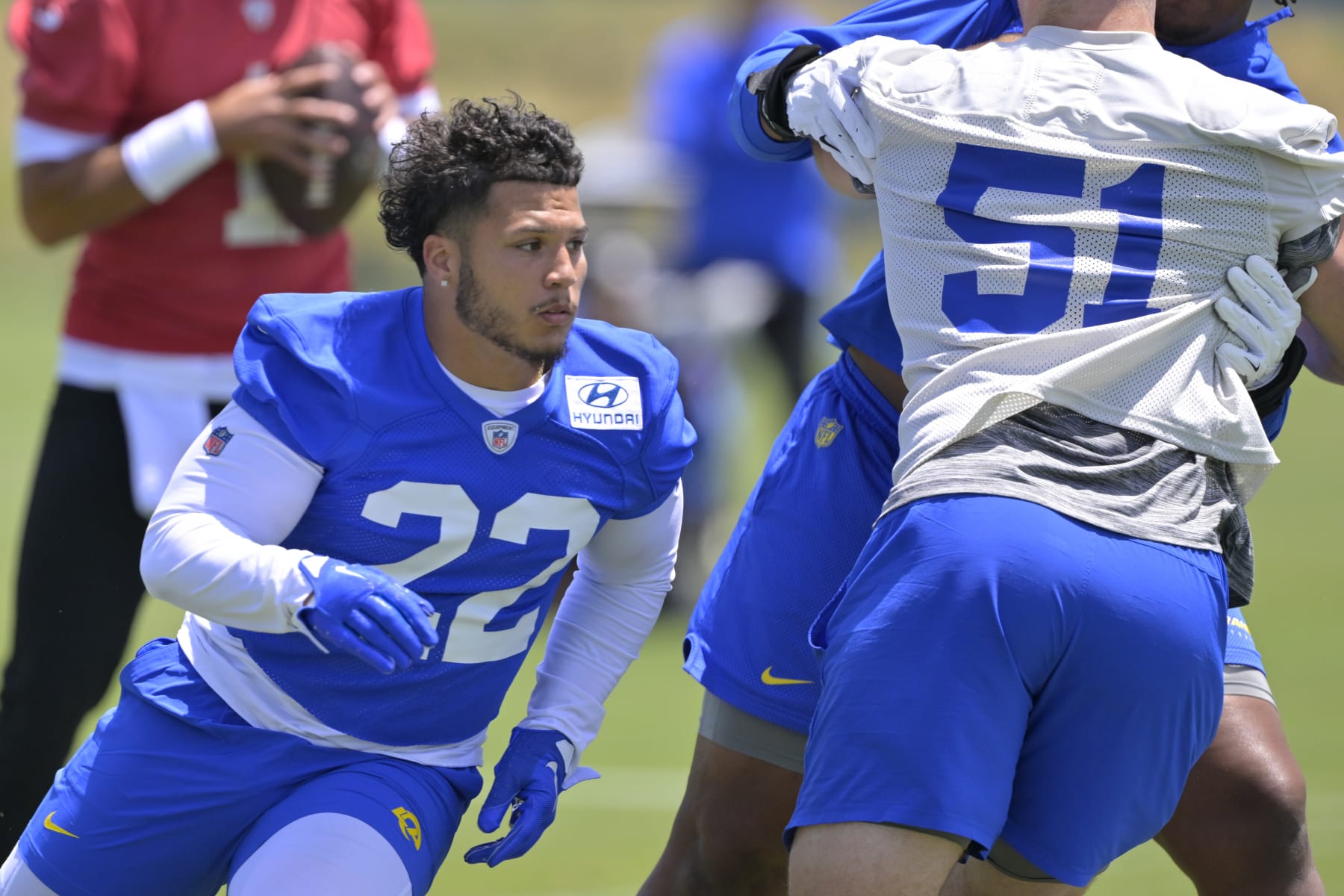 THOUSAND OAKS, CALIFORNIA - MAY 21:  Running back Blake Corum #22 of the Los Angeles Rams participates in drills during OTAs on May 21, 2024 at Cal Lutheran University in Thousand Oaks, California. (Photo by Jayne Kamin-Oncea/Getty Images)