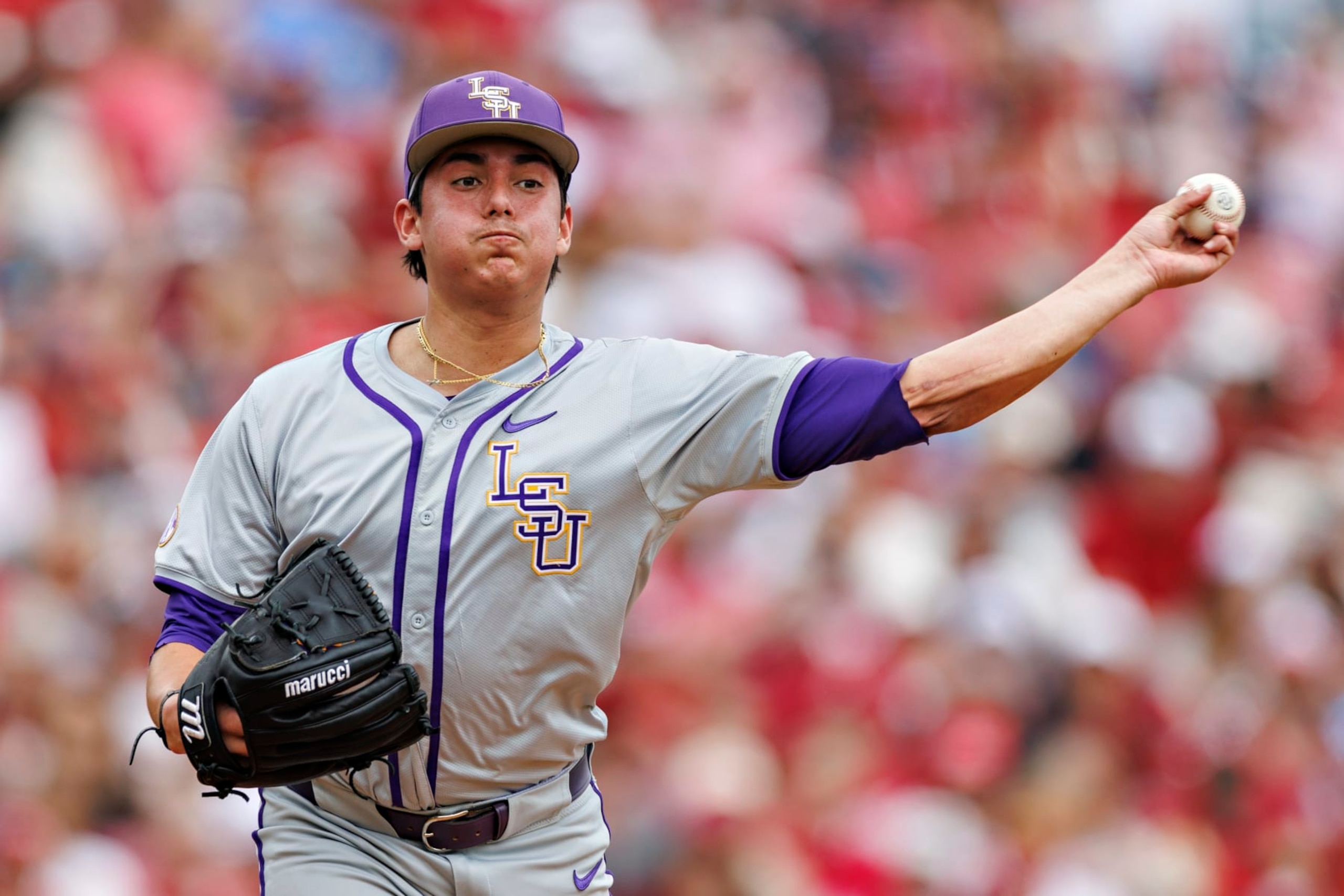 FAYETTEVILLE, ARKANSAS - MARCH 30: Gage Jump #23 of the LSU Tigers throws to first base during the game against the Arkansas Razorbacks at Baum-Walker Stadium at George Cole Field on March 30, 2024 in Fayetteville, Arkansas.  The Razorbacks defeated the Tigers 7-5.  (Photo by Wesley Hitt/Getty Images)