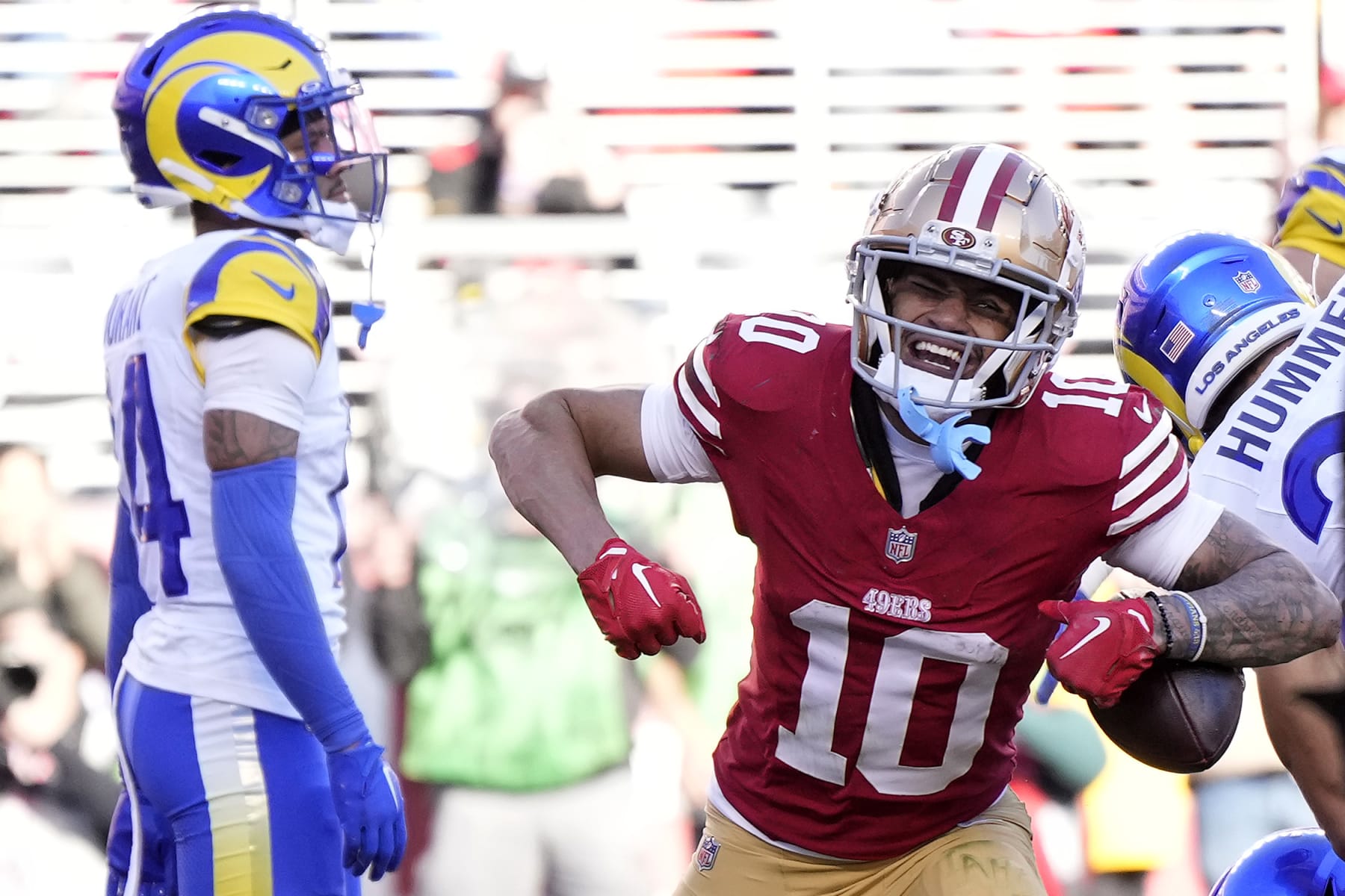 SANTA CLARA, CALIFORNIA - JANUARY 07: Ronnie Bell #10 of the San Francisco 49ers celebrates after a touchdown reception in the second quarter during a game against the Los Angeles Rams at Levi's Stadium on January 07, 2024 in Santa Clara, California. (Photo by Thearon W. Henderson/Getty Images)