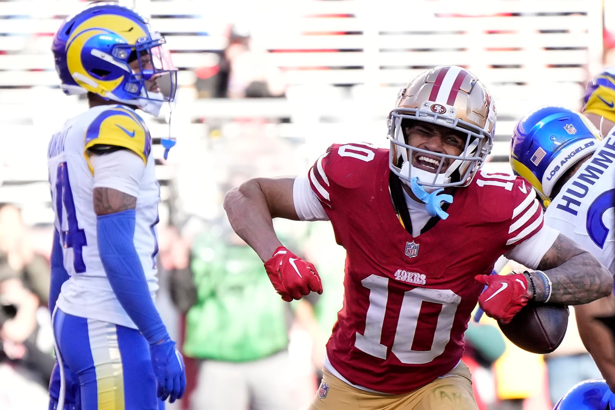 SANTA CLARA, CALIFORNIA - JANUARY 07: Ronnie Bell #10 of the San Francisco 49ers celebrates after a touchdown reception in the second quarter during a game against the Los Angeles Rams at Levi's Stadium on January 07, 2024 in Santa Clara, California. (Photo by Thearon W. Henderson/Getty Images)