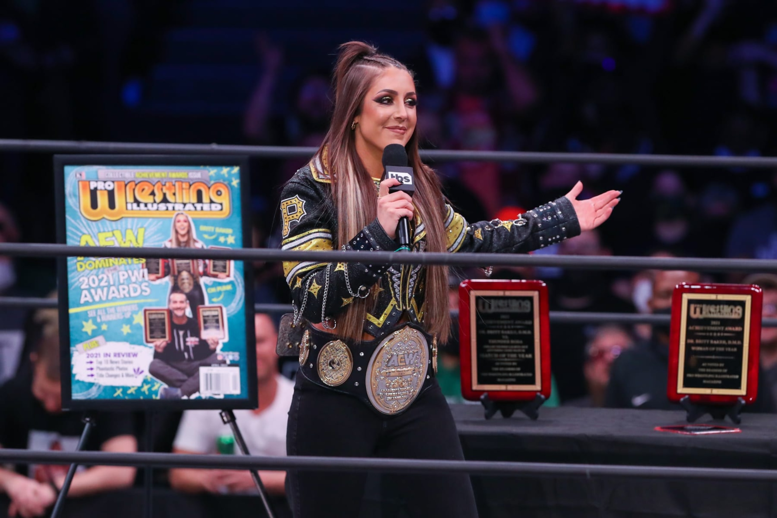 CLEVELAND, OH - JANUARY 26: Dr. Britt Baker, D.M.D. addresses the crowd during AEW Dynamite - Beach Break on January 26, 2022, at the Wolstein Center in Cleveland, OH. (Photo by Frank Jansky/Icon Sportswire via Getty Images) CLEVELAND, OH - JANUARY 26: Dr. Britt Baker, D.M.D. addresses the crowd during AEW Dynamite - Beach Break on January 26, 2022, at the Wolstein Center in Cleveland, OH. (Photo by Frank Jansky/Icon Sportswire via Getty Images)