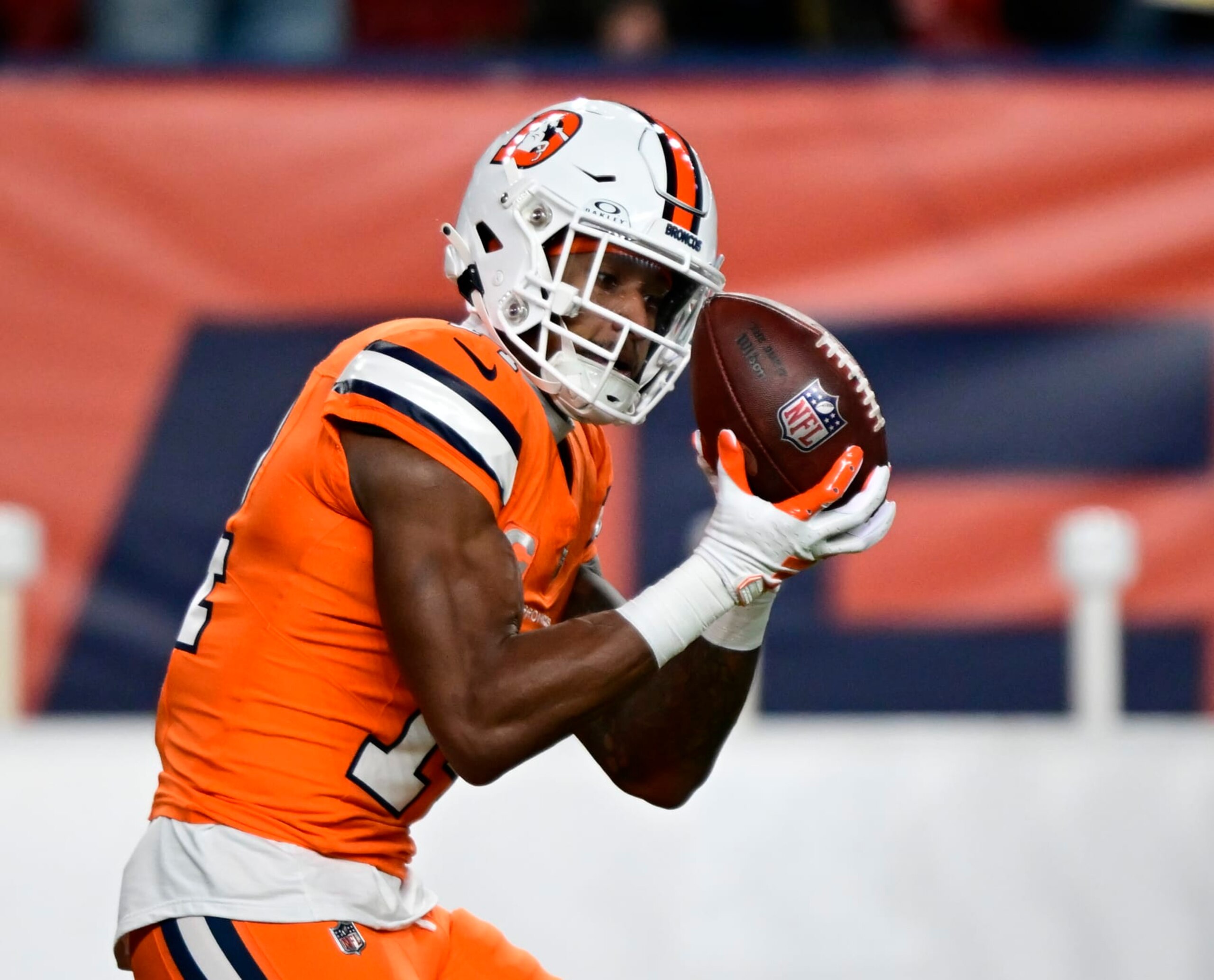 DENVER, CO - DECEMBER 24: Denver Broncos wide receiver Courtland Sutton (14) makes a catch during warmups before playing the New England Patriots at Empower Field at Mile High in Denver, Colorado on Sunday December 24, 2023. (Photo by Andy Cross/MediaNews Group/The Denver Post via Getty Images)
