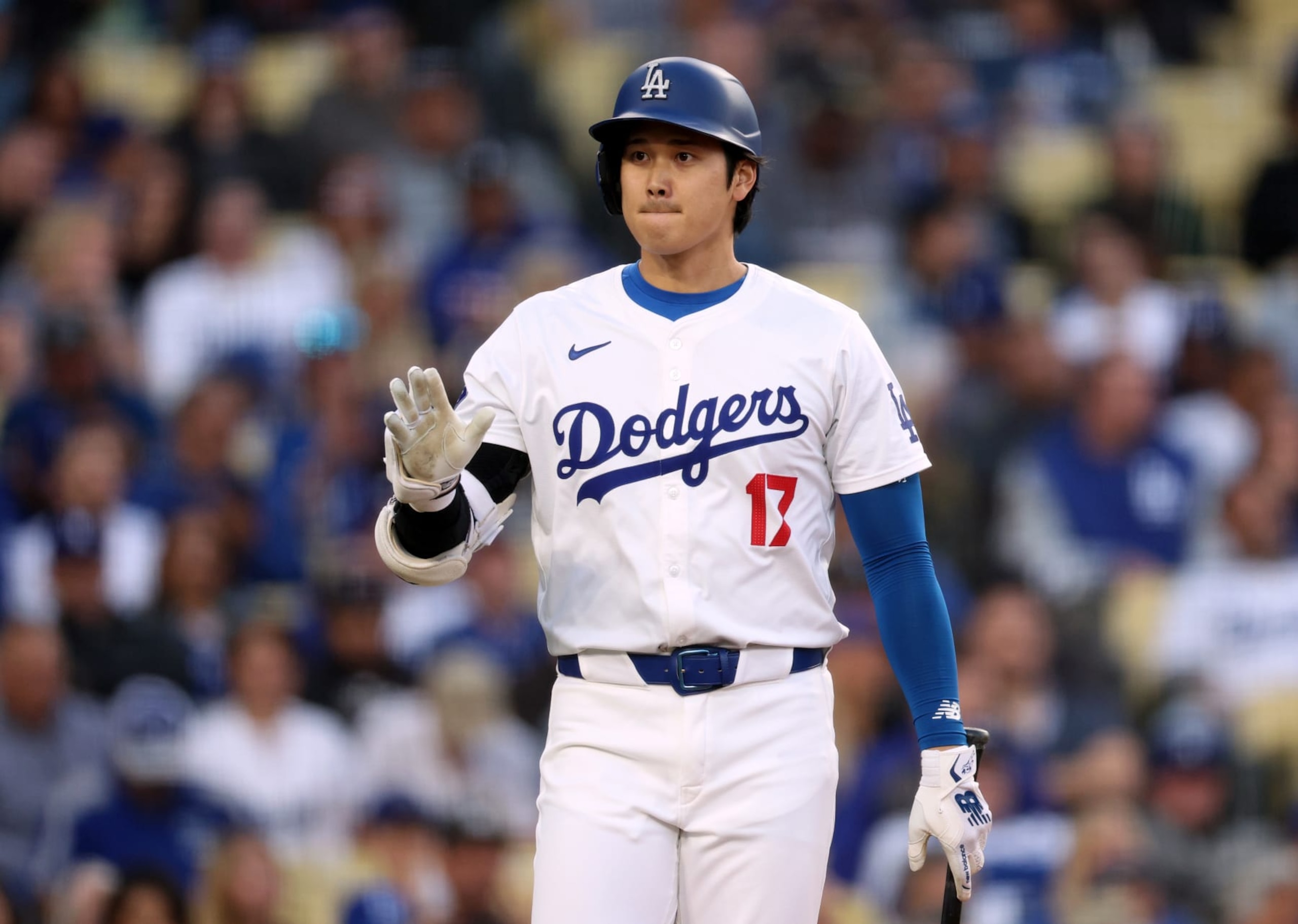 LOS ANGELES, CALIFORNIA - MAY 21: Shohei Ohtani #17 of the Los Angeles Dodgers reacts as he comes to the plate during the first inning against the Arizona Diamondbacks at Dodger Stadium on May 21, 2024 in Los Angeles, California. (Photo by Harry How/Getty Images)