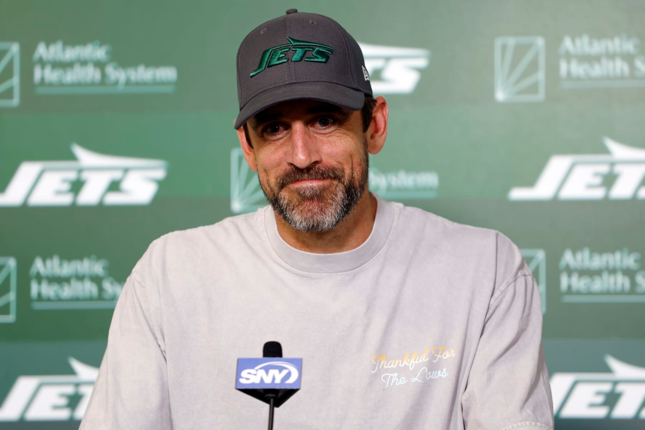 FLORHAM PARK, NEW JERSEY - MAY 21: Aaron Rodgers #8 of the New York Jets speaks to the media during the New York Jets OTA Offseason Workout at Atlantic Health Jets Training Center on May 21, 2024 in Florham Park, New Jersey. (Photo by Sarah Stier/Getty Images)