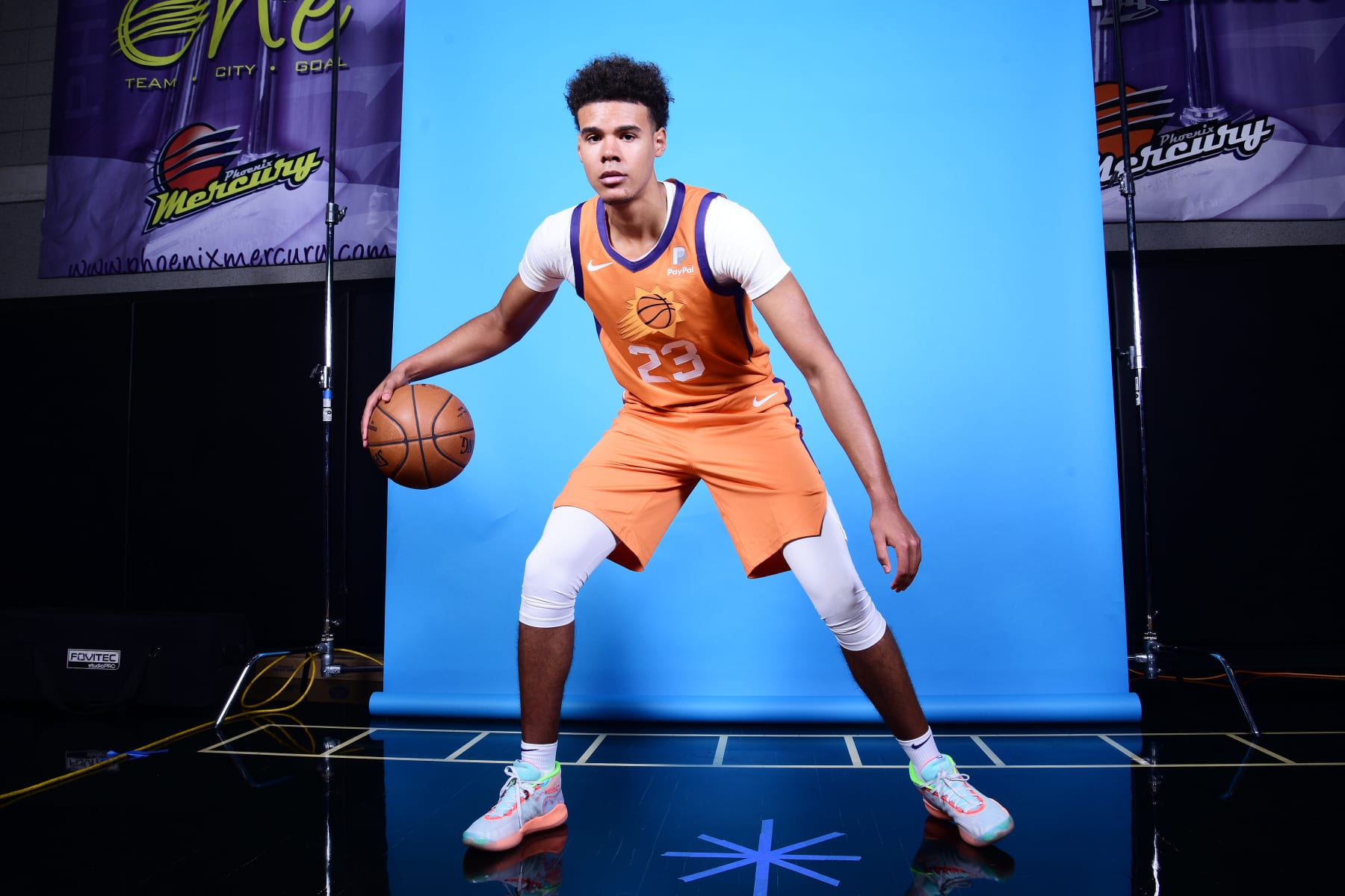 PHOENIX, AZ - SEPTEMBER 30: Cameron Johnson #23 of the Phoenix Suns poses for a portrait during media day on September 30, 2019 at Talking Stick Resort Arena in Phoenix, Arizona. NOTE TO USER: User expressly acknowledges and agrees that, by downloading and or using this Photograph, user is consenting to the terms and conditions of the Getty Images License Agreement. Mandatory Copyright Notice: Copyright 2019 NBAE (Photo by Michael Gonzales NBAE via Getty Images)