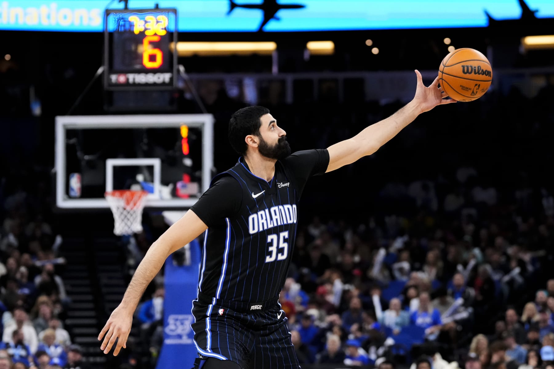 ORLANDO, FLORIDA - JANUARY 22: Goga Bitadze #35 of the Orlando Magic catches a pass against the Cleveland Cavaliers during the fourth quarter at Kia Center on January 22, 2024 in Orlando, Florida. NOTE TO USER: User expressly acknowledges and agrees that, by downloading and or using this photograph, User is consenting to the terms and conditions of the Getty Images License Agreement. (Photo by Rich Storry/Getty Images)