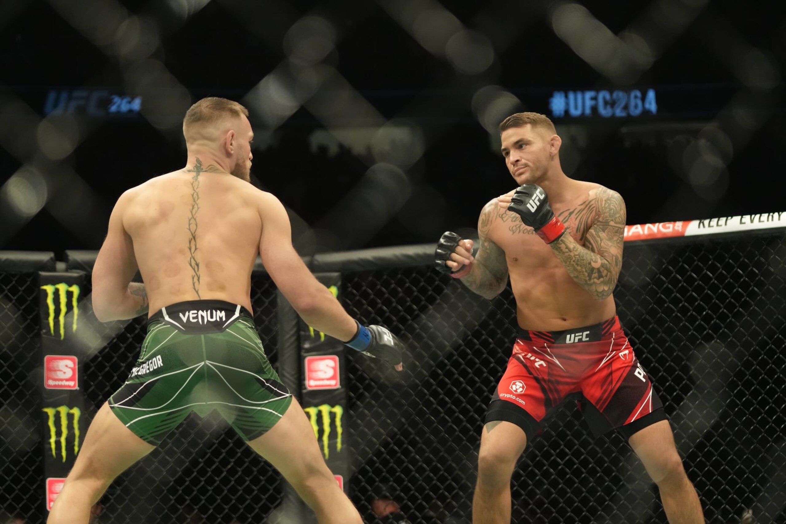 LAS VEGAS, NV - JULY 10: (L-R) Conor McGregor battles Dustin Poirier in their lightweight bout during UFC 264 at T-Mobile Arena on July 10, 2021, in Las Vegas, Nevada, United States. (Photo by Louis Grasse/PxImages/Icon Sportswire via Getty Images)