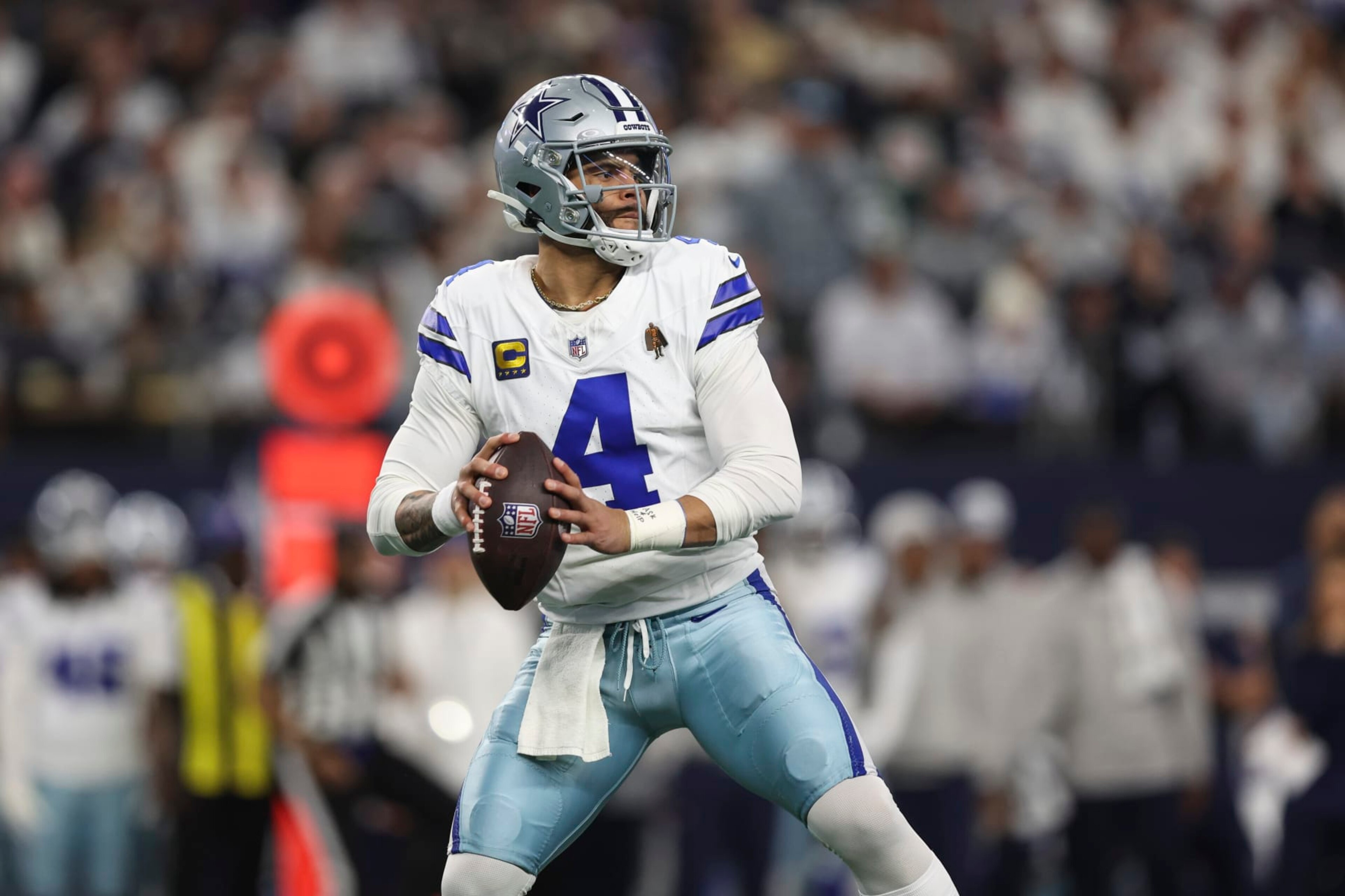ARLINGTON, TX - JANUARY 14: Dak Prescott #4 of the Dallas Cowboys throws the ball during an NFL wild-card playoff football game against the Green Bay Packers at AT&T Stadium on January 14, 2024 in Arlington, Texas. (Photo by Perry Knotts/Getty Images) ARLINGTON, TX - JANUARY 14: Dak Prescott #4 of the Dallas Cowboys throws the ball during an NFL wild-card playoff football game against the Green Bay Packers at AT&T Stadium on January 14, 2024 in Arlington, Texas. (Photo by Perry Knotts/Getty Images)
