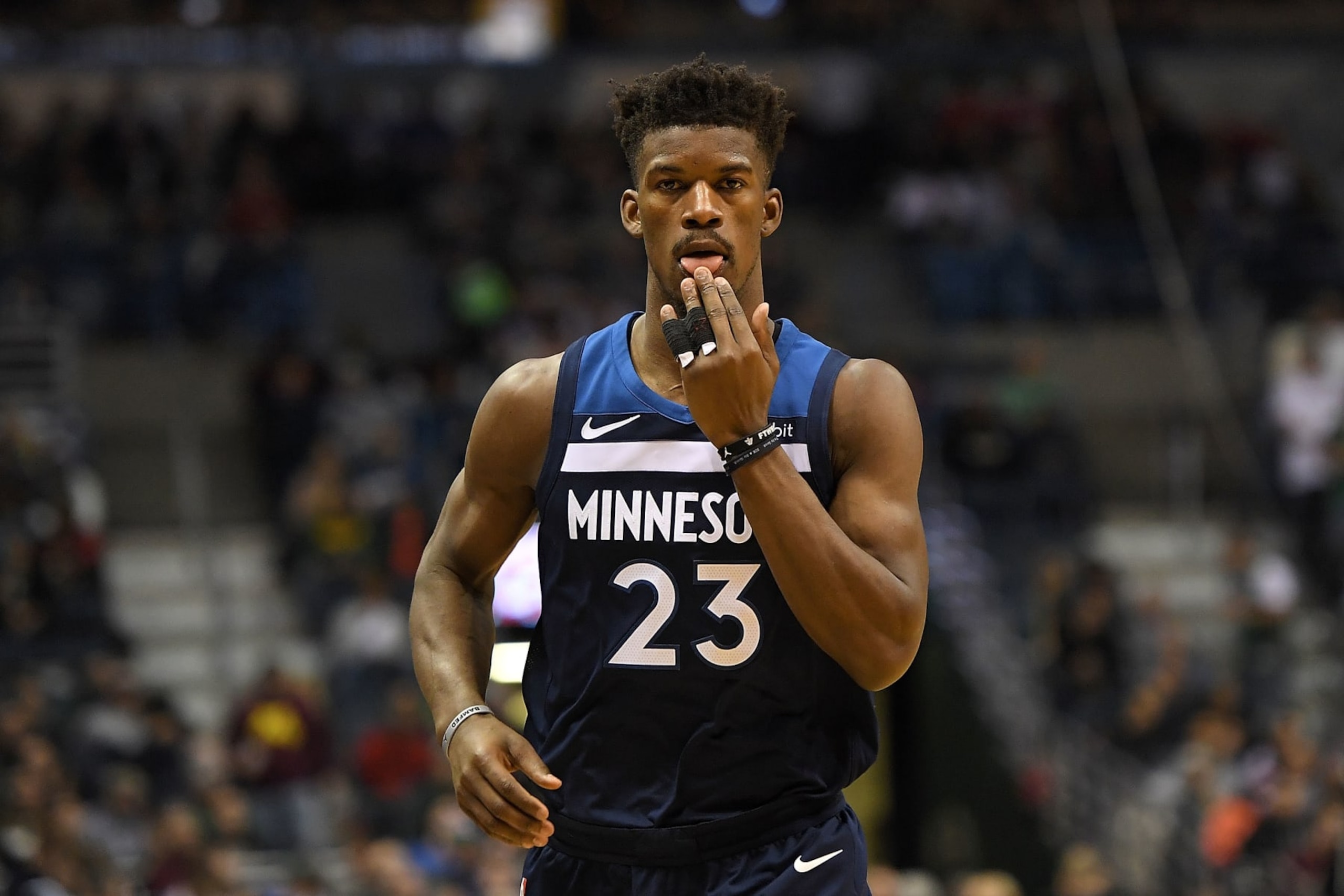 MILWAUKEE, WI - DECEMBER 28:  Jimmy Butler #23 of the Minnesota Timberwolves walks backcourt during a game during a game against the Milwaukee Bucks at the Bradley Center on December 28, 2017 in Milwaukee, Wisconsin.  NOTE TO USER: User expressly acknowledges and agrees that, by downloading and or using this photograph, User is consenting to the terms and conditions of the Getty Images License Agreement.  (Photo by Stacy Revere/Getty Images)