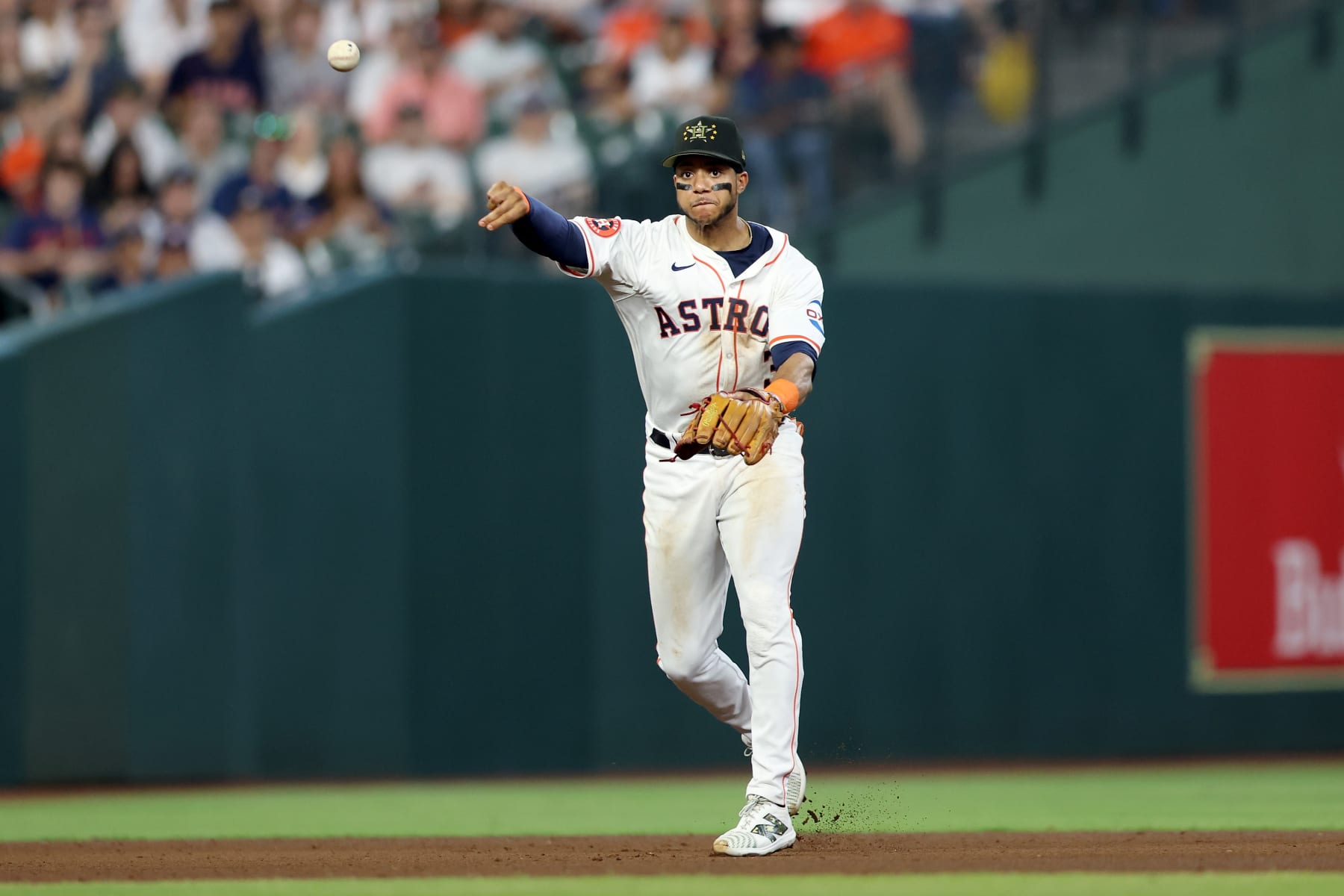 HOUSTON, TEXAS - MAY 18: Jeremy Peña #3 of the Houston Astros throws to first for an out in the fourth inning against the Milwaukee Brewers at Minute Maid Park on May 18, 2024 in Houston, Texas. (Photo by Tim Warner/Getty Images)