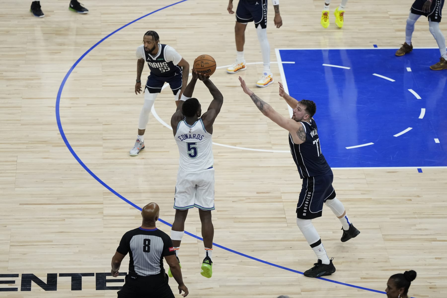 Derrick Jones Jr., Anthony Edwards and Luka DonÄiÄ