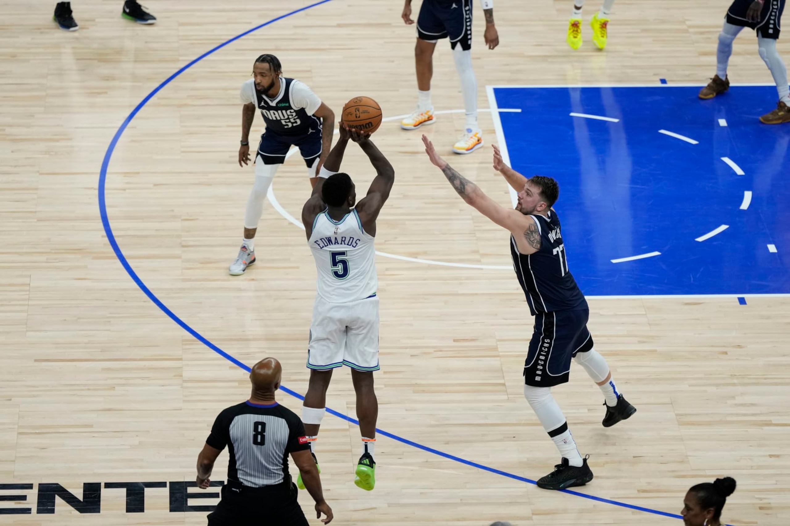 Derrick Jones Jr., Anthony Edwards and Luka DonÄiÄ