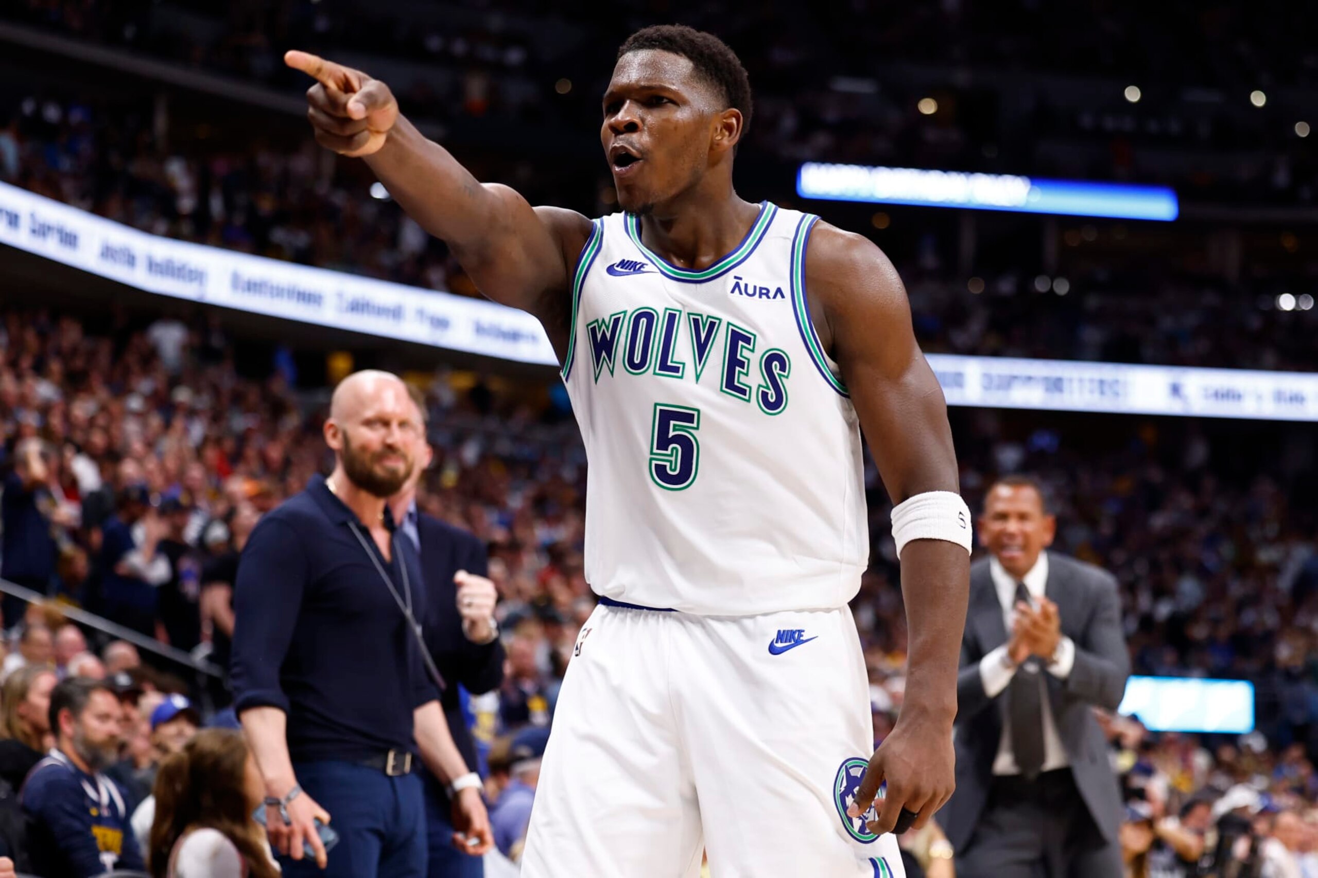 DENVER, COLORADO - MAY 19: Anthony Edwards #5 of the Minnesota Timberwolves reacts to a three point basket during the fourth quarter against the Denver Nuggets in Game Seven of the Western Conference Second Round Playoffs at Ball Arena on May 19, 2024 in Denver, Colorado. NOTE TO USER: User expressly acknowledges and agrees that, by downloading and or using this photograph, User is consenting to the terms and conditions of the Getty Images License Agreement. (Photo by C. Morgan Engel/Getty Images)