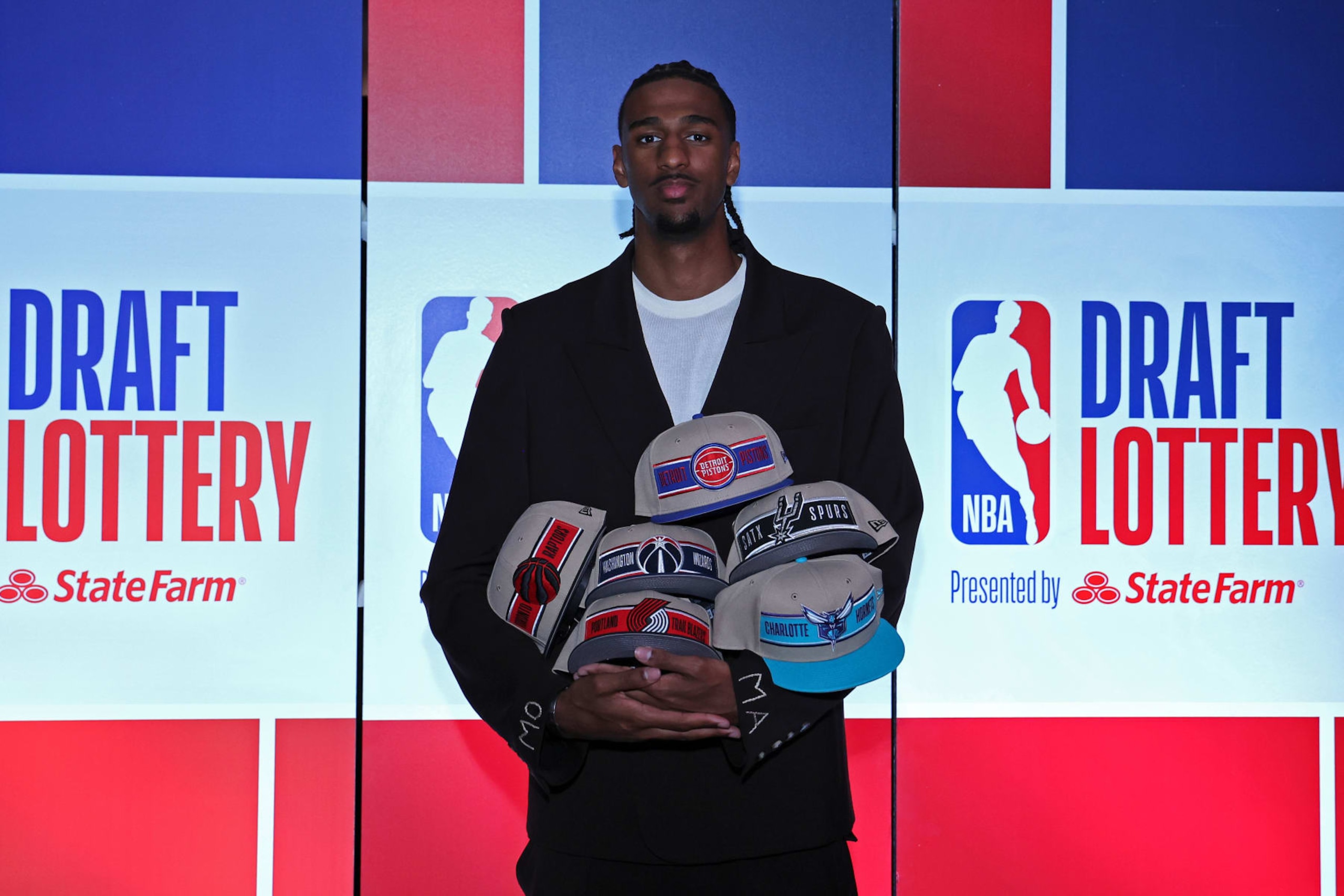 CHICAGO, IL - MAY 12 : Alex Sarr poses for a photograph during the 2024 NBA Draft Lottery on May 12, 2024 at McCormick Convention Center in Chicago, Illinois. NOTE TO USER: User expressly acknowledges and agrees that, by downloading and or using this photograph, User is consenting to the terms and conditions of the Getty Images License Agreement. Mandatory Copyright Notice: Copyright 2024 NBAE (Photo by Jeff Haynes/NBAE via Getty Images) CHICAGO, IL - MAY 12 : Alex Sarr poses for a photograph during the 2024 NBA Draft Lottery on May 12, 2024 at McCormick Convention Center in Chicago, Illinois. NOTE TO USER: User expressly acknowledges and agrees that, by downloading and or using this photograph, User is consenting to the terms and conditions of the Getty Images License Agreement. Mandatory Copyright Notice: Copyright 2024 NBAE (Photo by Jeff Haynes/NBAE via Getty Images)